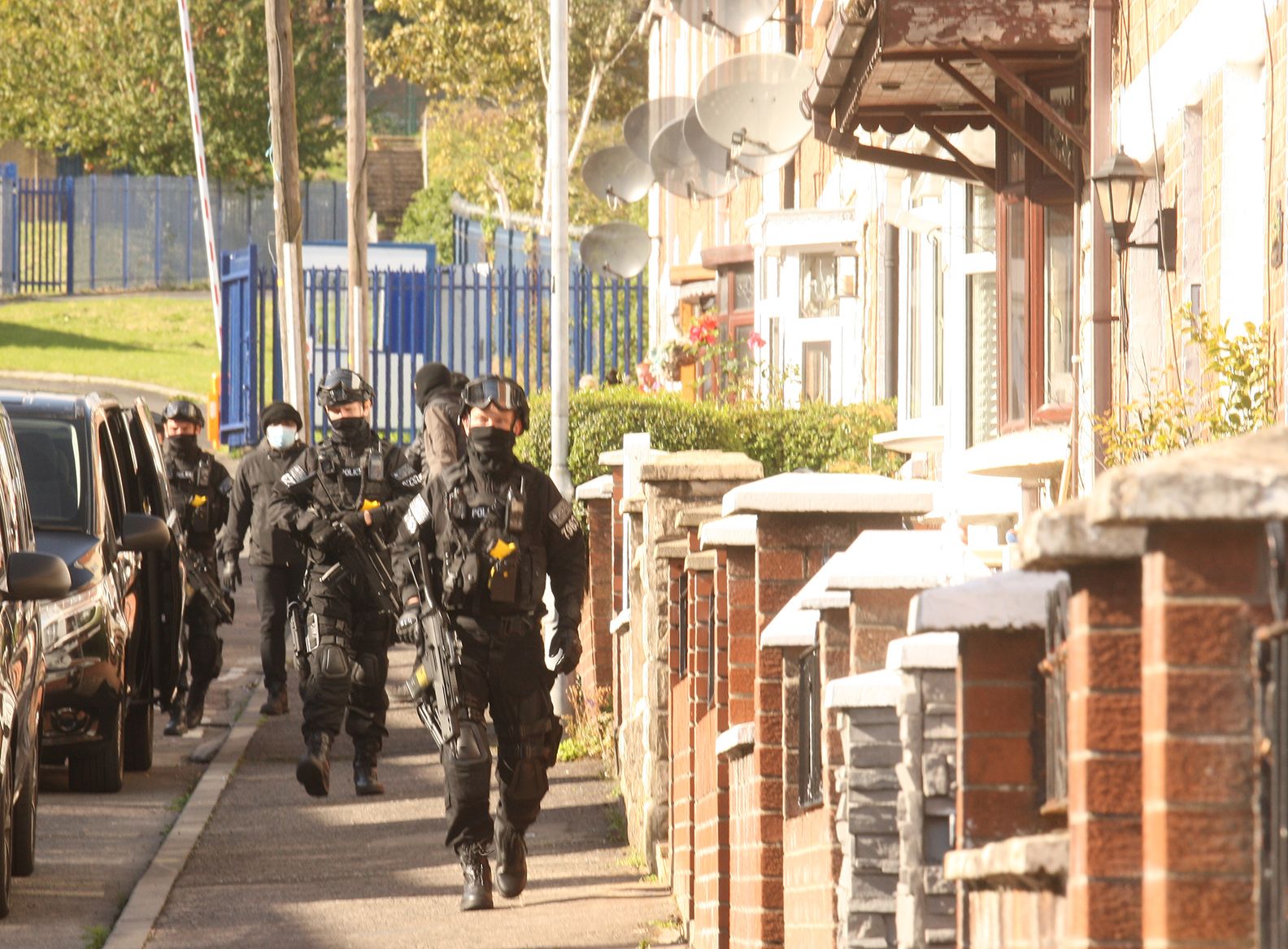 CAMERA, ACTION: Our photographer Thomas McMullan was on hand as this scene in Line of Duty developed in Beechmount on Monday