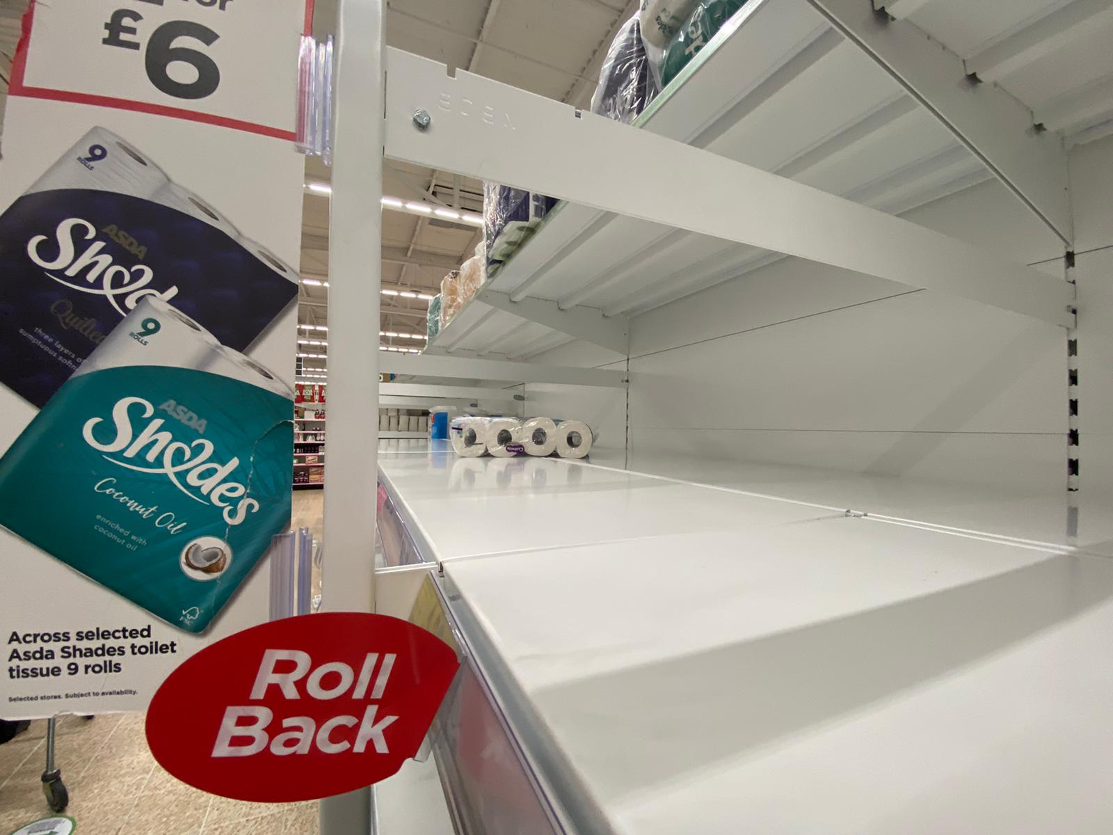 GONE: Shelves stripped again as panicking shoppers react to new restrictions