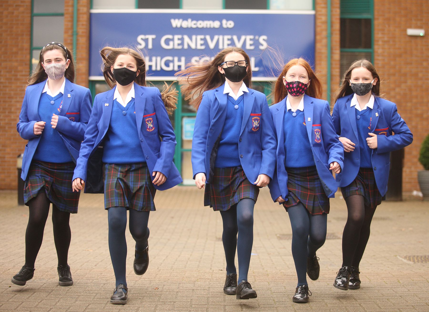 SAFETY FIRST: St Genevieve’s pupils wear face coverings while in corridors and on public transport