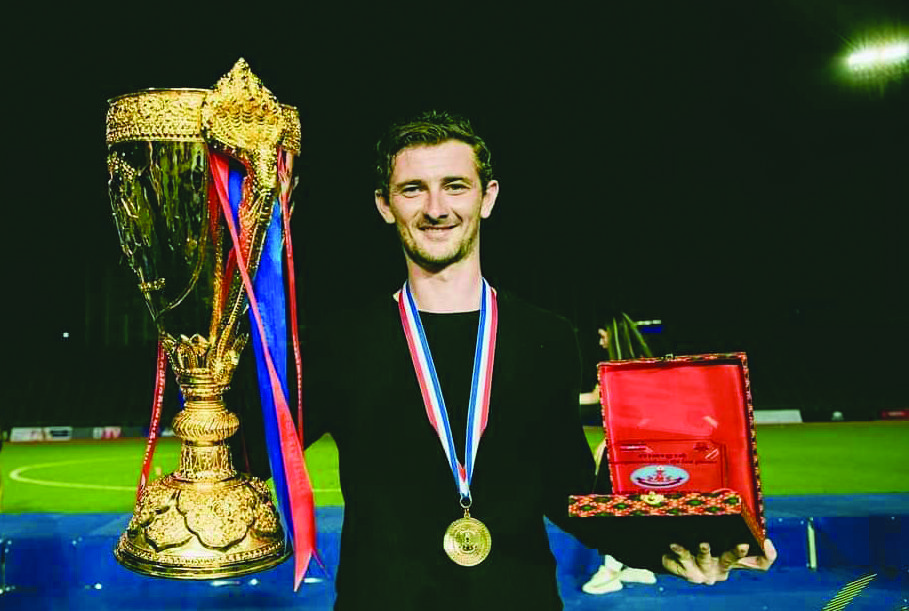 Colum Curtis pictured with the Hun Sen Cup after his Vishaka FC claimed the trophy for the first time in the club’s young history