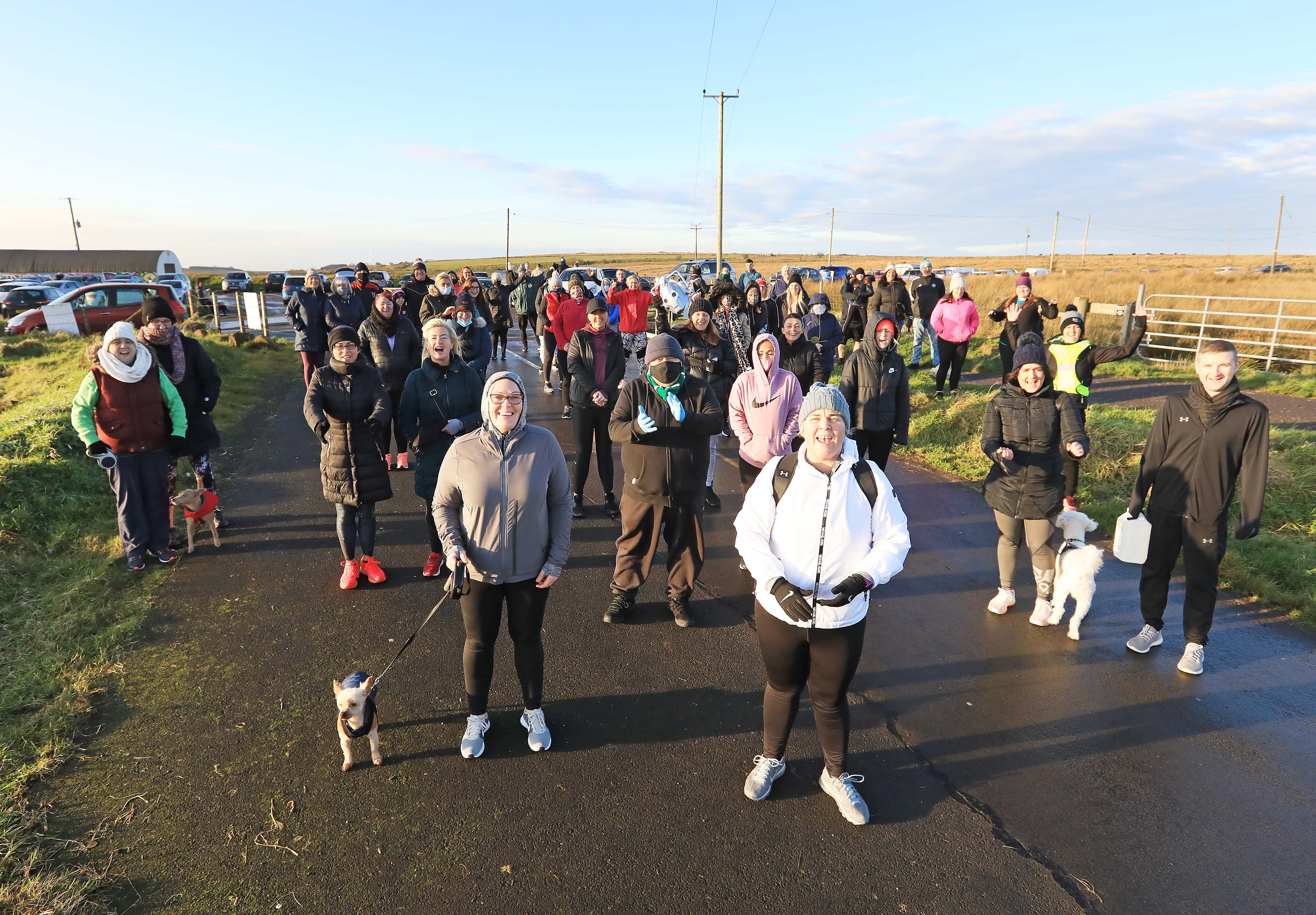GREAT CAUSE: Jean McKiernan and Pauline Hughes lead the walkers on the Black Mountain on Saturday morning