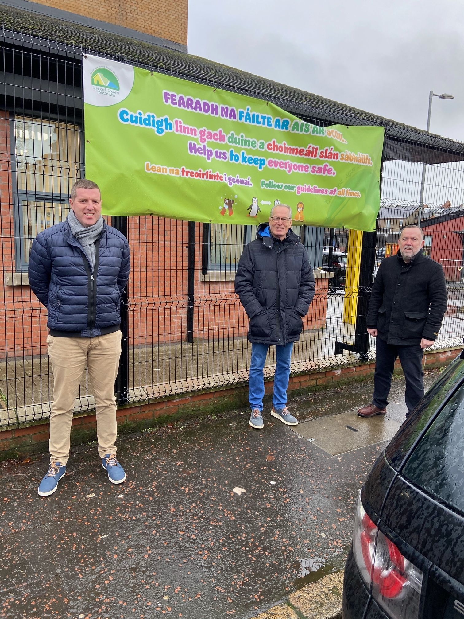 Sinn Féin MLA Gerry Kelly with Philip Rooney and Ciaran McCanava from Colaiste Feirste Project Board at Bunscoil Bheann Mhadagain on the Cliftonville Road