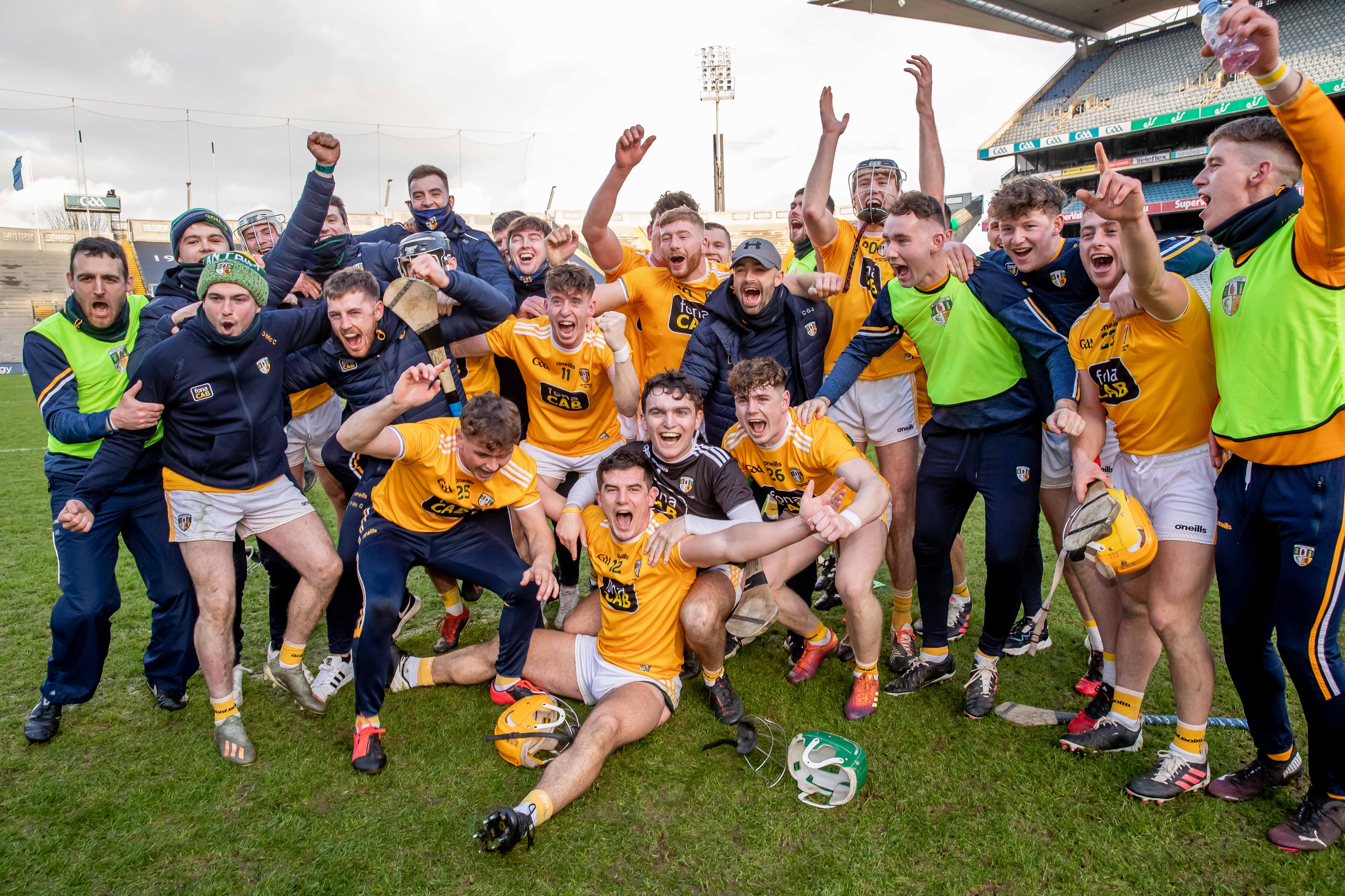 Antrim players celebrate their triumph over Kerry on Sunday afternoon