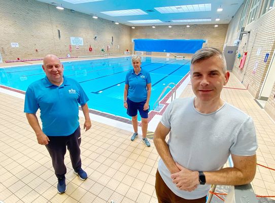 MAKING WAVES: Whiterock Leisure Centre will be opening its pool for the first time since March next week. Leisure Centre staff Sean McChesney and Monica Mulholland chat with Cllr Stevie Corr ahead of the reopening people can get back into the pool which h
