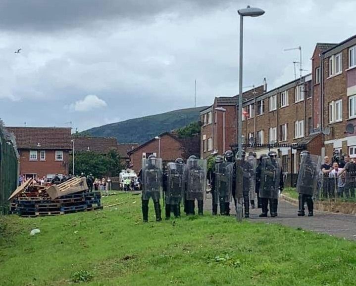 CONFRONTATION: PSNI move in to Divis to support contractors removing bonfire materials