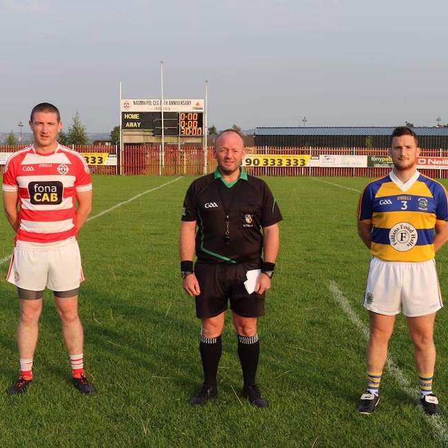 Sean Bradley and Conor Hasson with referee Marty Quinn