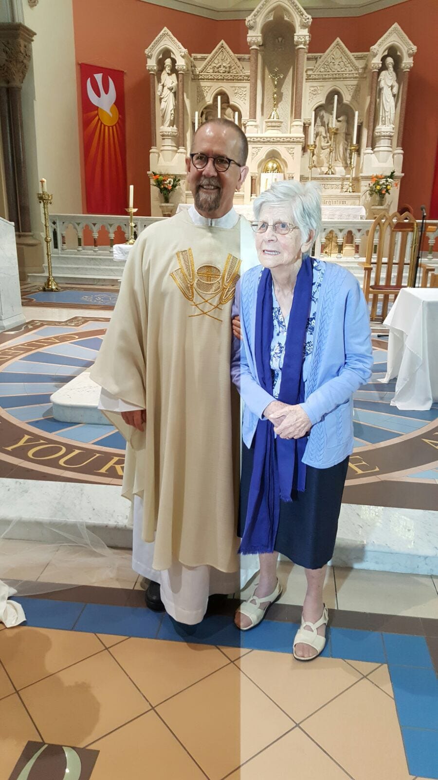 MISSING, FEARED DEAD: Fr Stephen Rooney with his mother Catherine, now deceased, in St Matthew\'s Church to mark her 90th birthday. 
