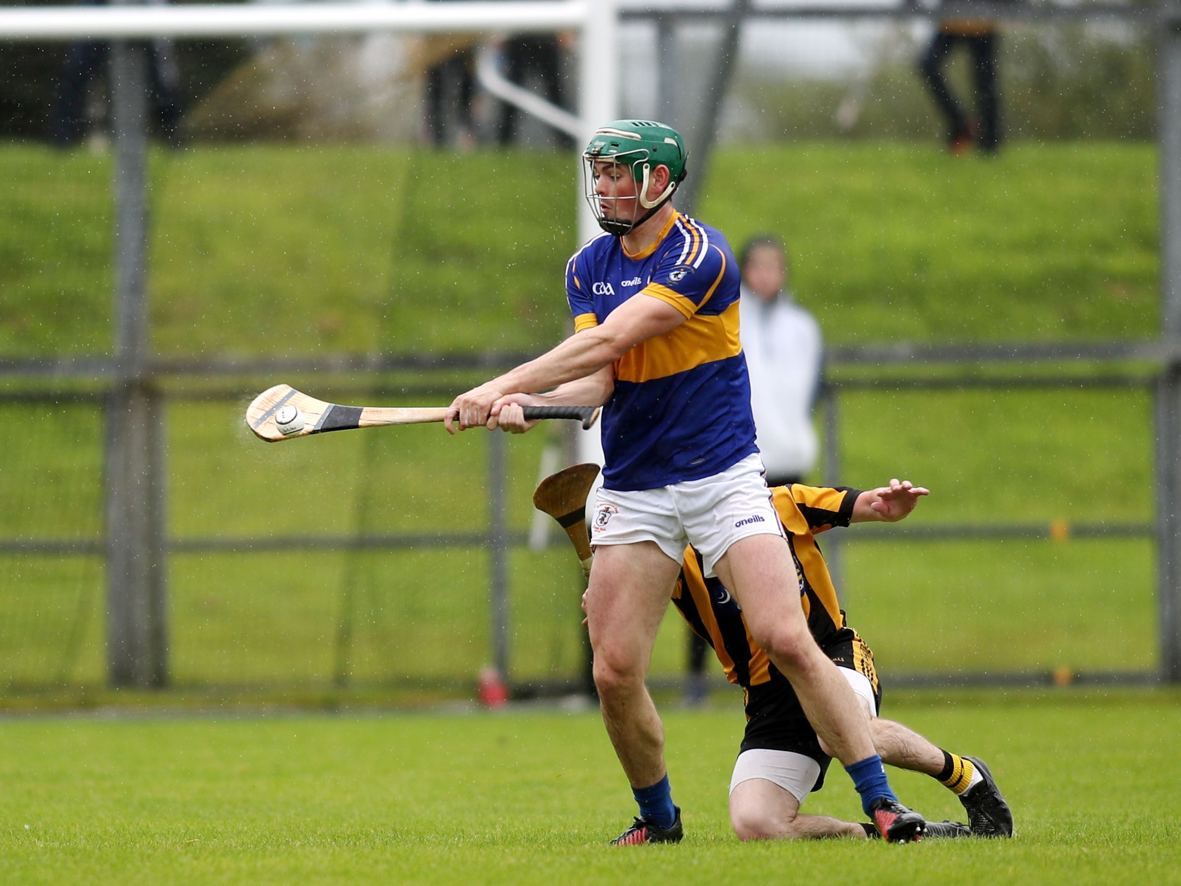 Gerard Walsh plays the ball out of defence in Ballycastle on Sunday afternoon