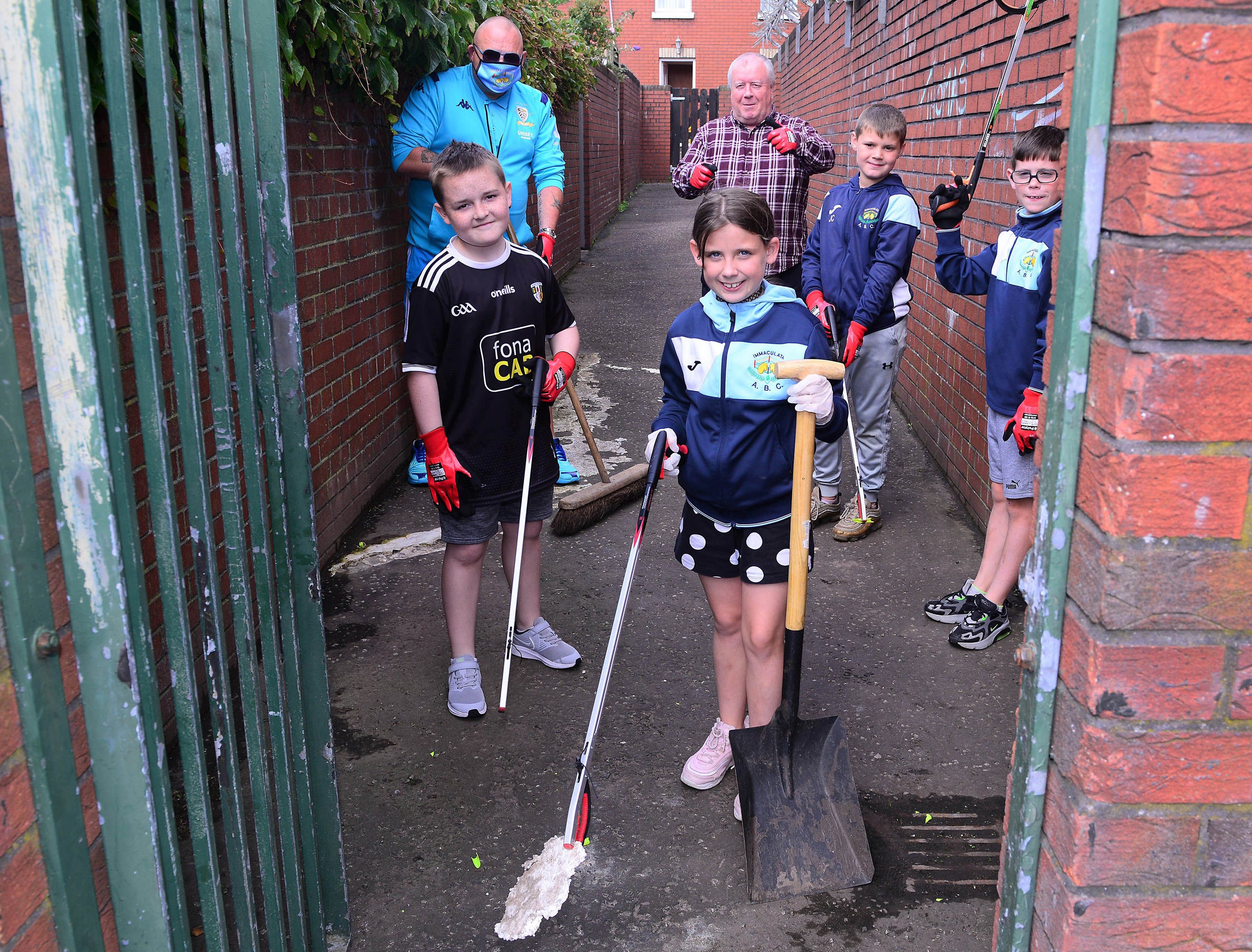 IN THIS TOGETHER: Young people joined in the clean-up