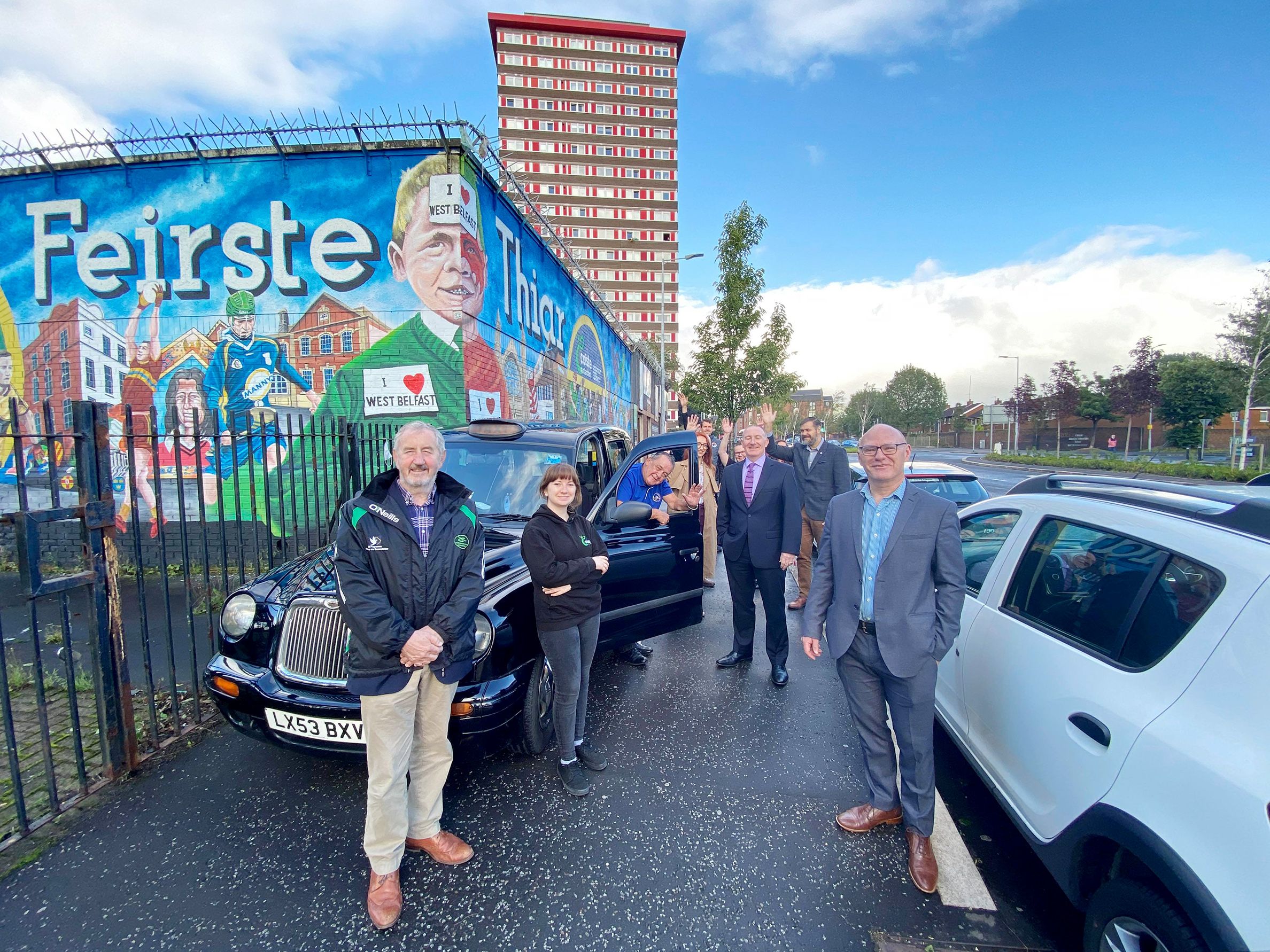 FÁILTE: Paul Maskey MP joins local tourism providers celebrating the double tourism success for West Belfast this week