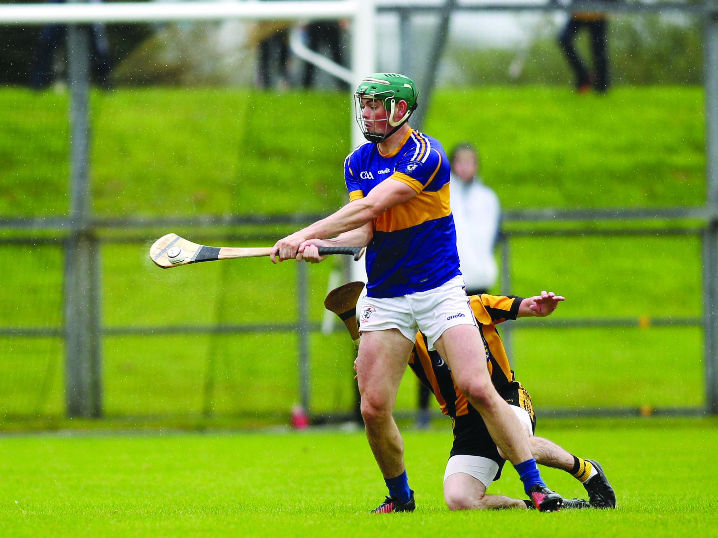 Gerard Walsh, pictured in action for Rossa\'s hurlers against Ballycastle last weekend, is one of a number of dual players who face a testing schedule over the next week as the Shaws Road side seek to progress in both Hurling and Football Championships