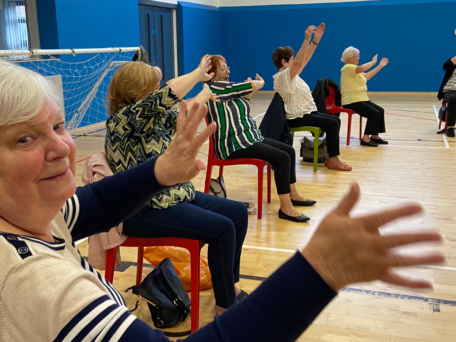BACK TOGETHER: Theresa Hyland and friends enjoy the workout with Fitness Freddie