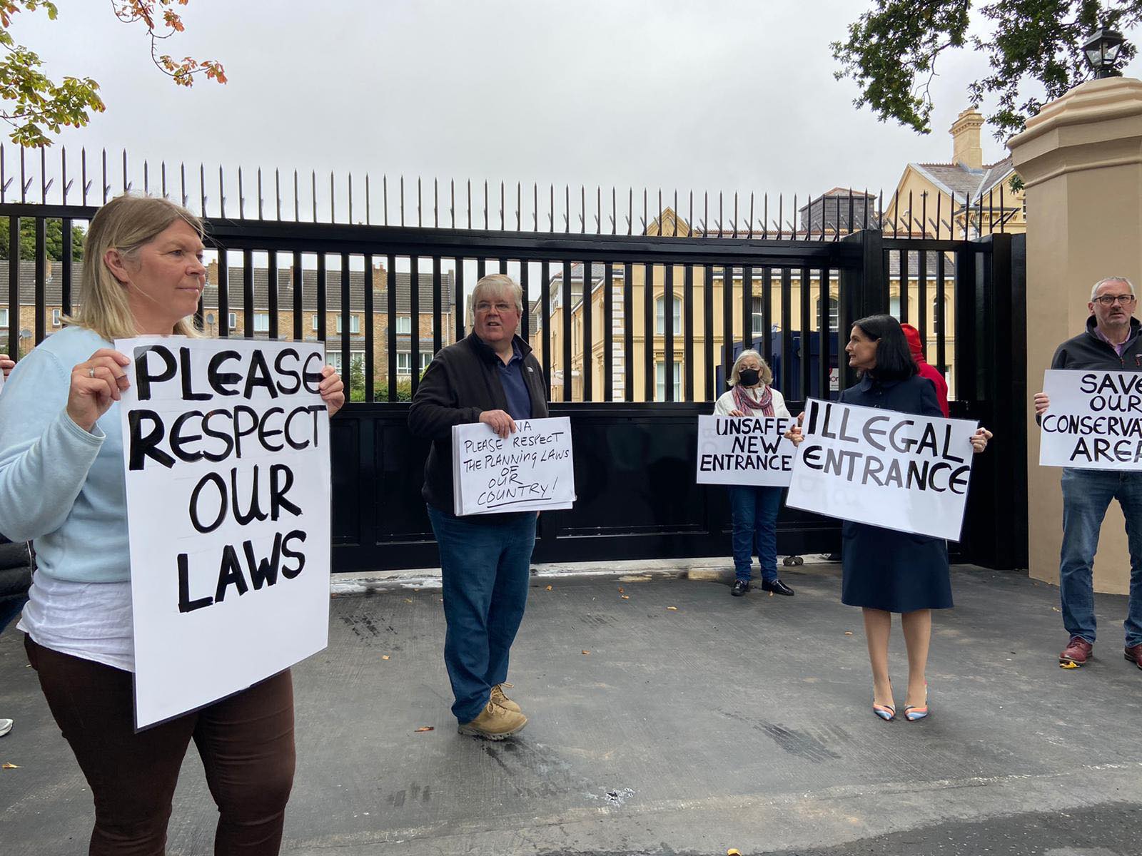 PROTEST: Residents from nearby Adelaide Park protest outside the Chinese Consulate on the Malone Road