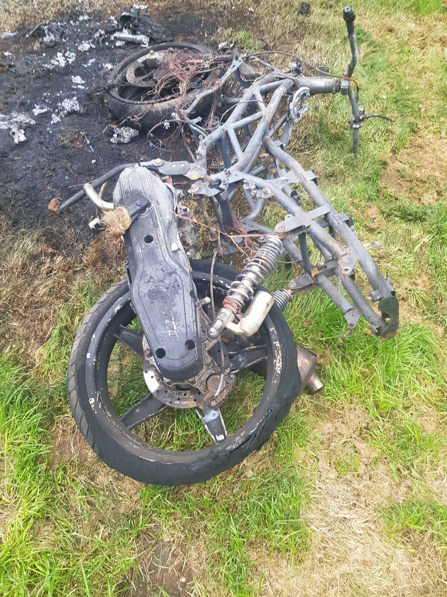 DESTROYED: The black CPI GTR 50cc motorbike was stolen and later found burnt out in Ardoyne