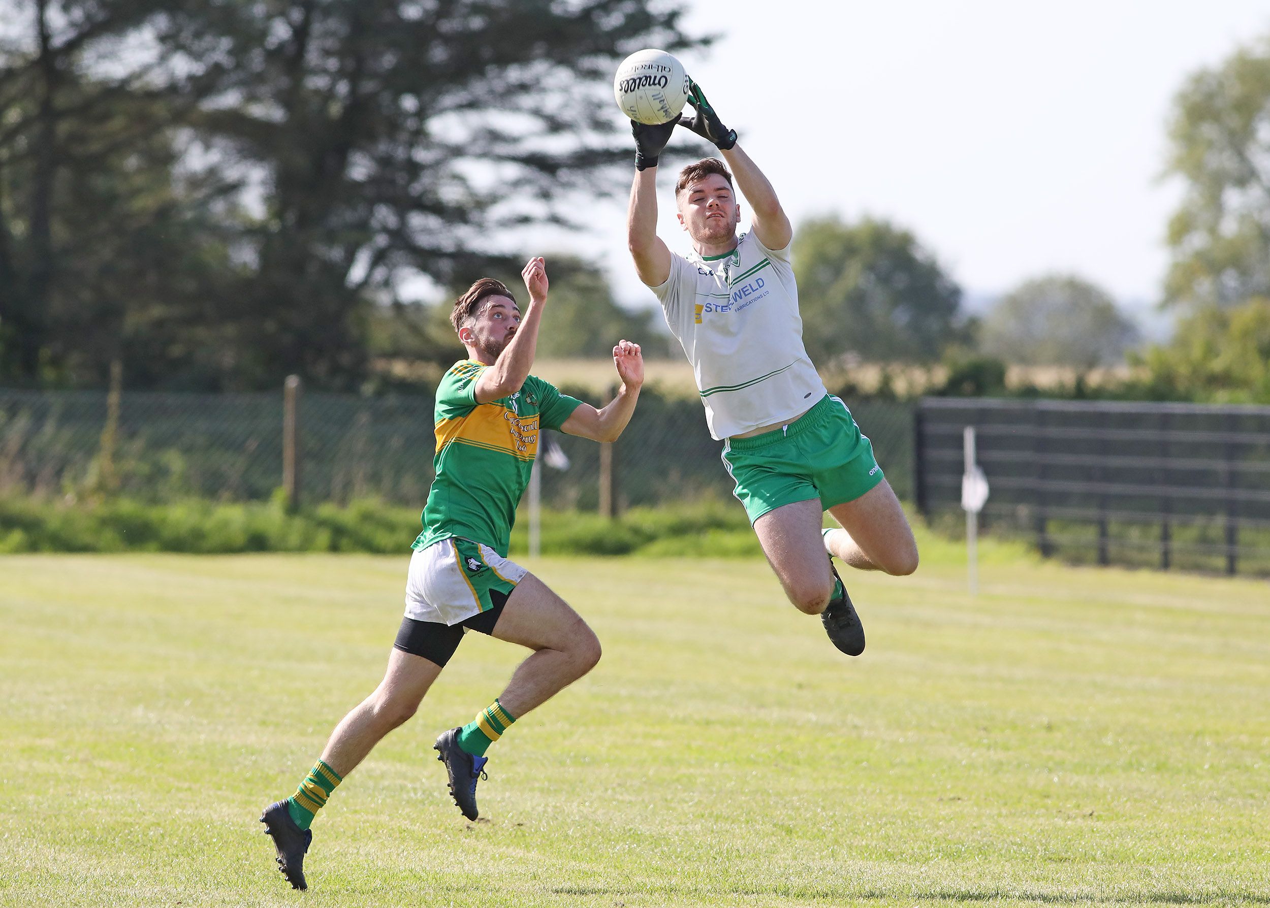 St Comgall\'s rose higher during Saturday\'s semi-final against Pearse\'s
