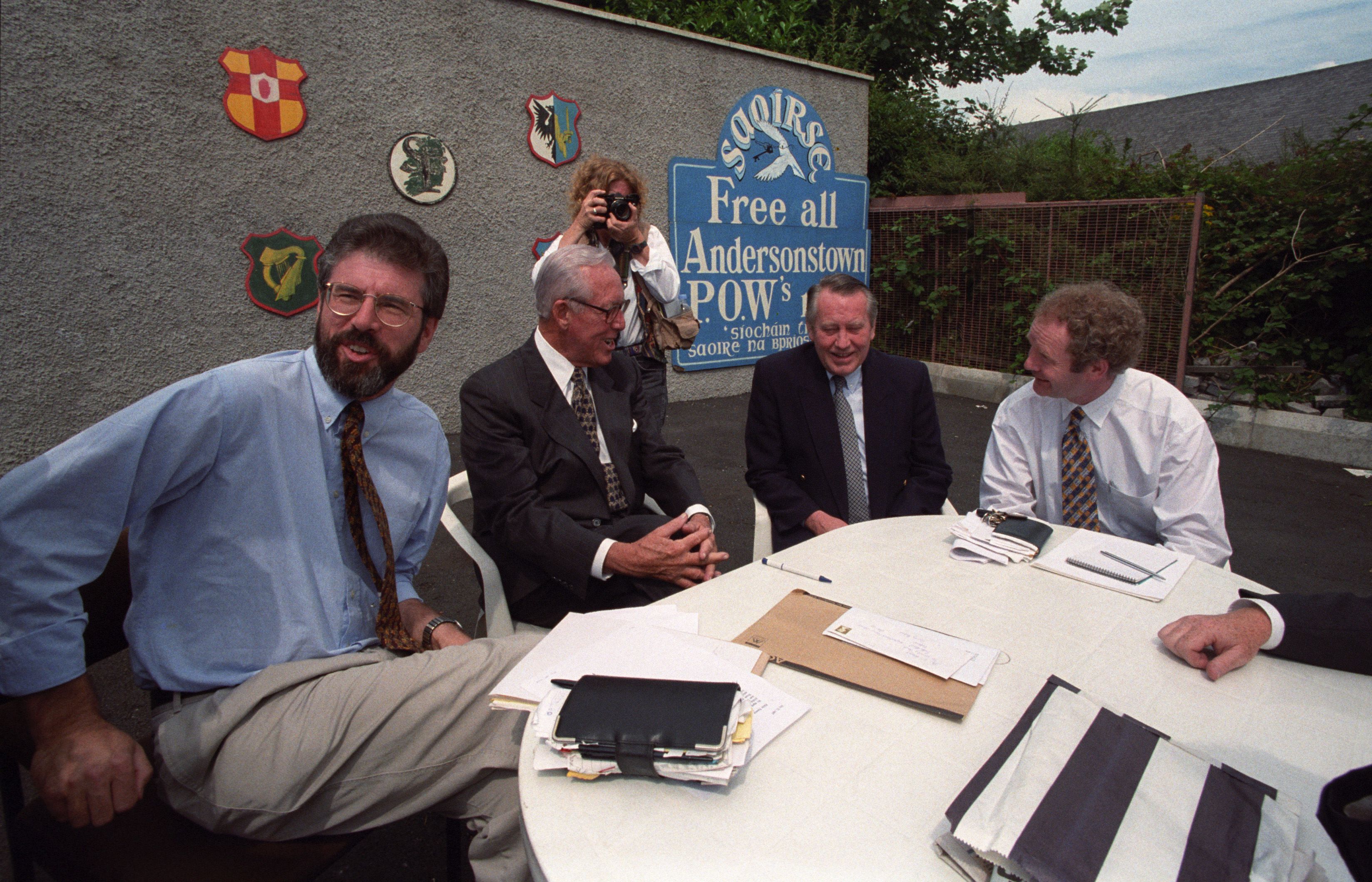 IT’S GOOD TO TALK: Gerry Adams, Bill Flynn, chairman of Mutual of America Insurance Company, Chuck Feeney and Martin Maguinness meeting Sinn Féin at Connolly House in July 1997 – the influential Americans were in Belfast in a bid to secure a restoration o