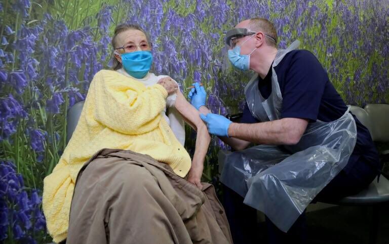 JAB: Eileen Lynch (94) receives the first dose of the Oxford/AstraZeneca vaccine from Dr Michael McKenna 