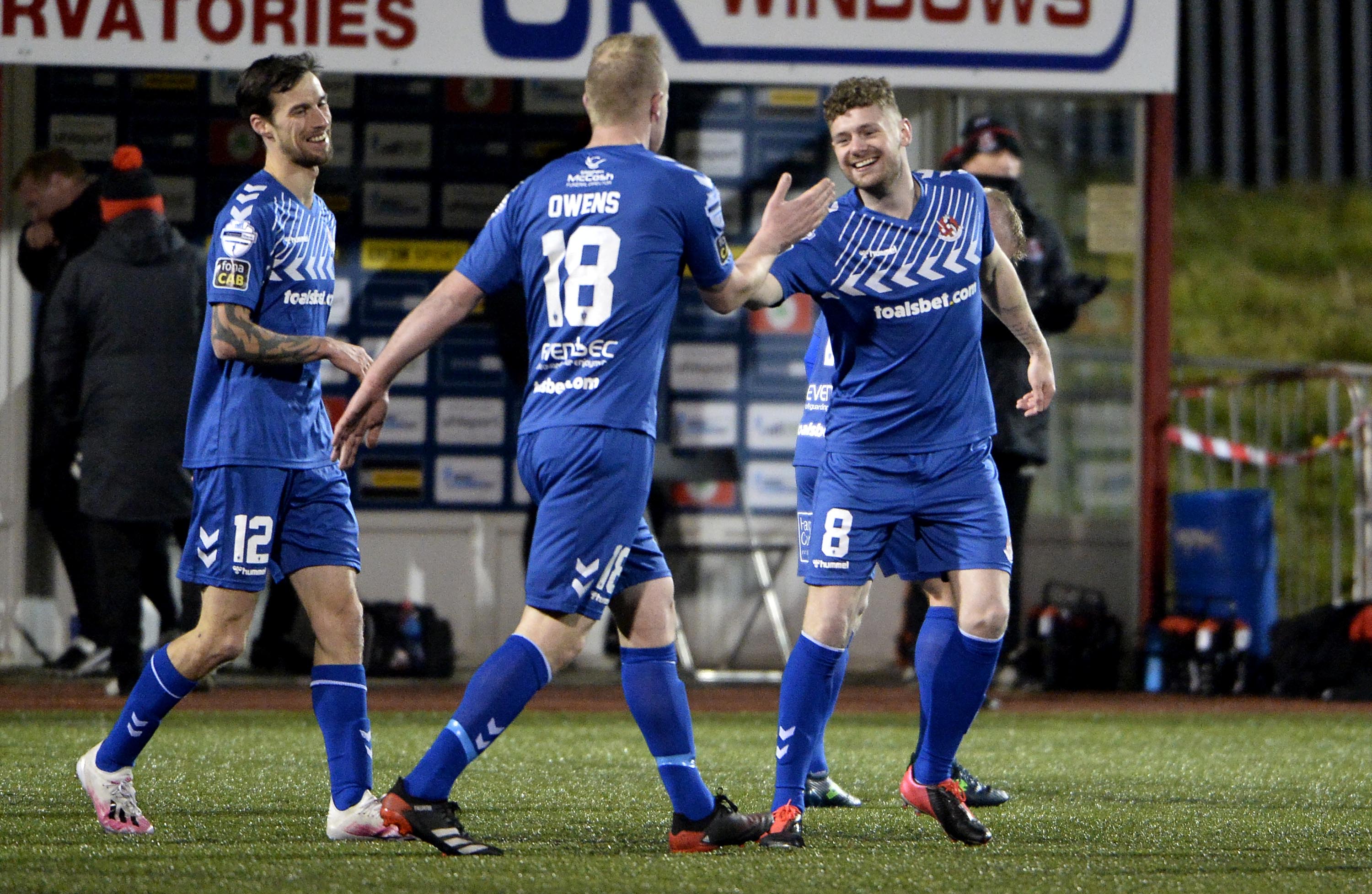 Ben Kennedy is congratulated after netting the last-gasp equaliser at Solitude on Saturday
