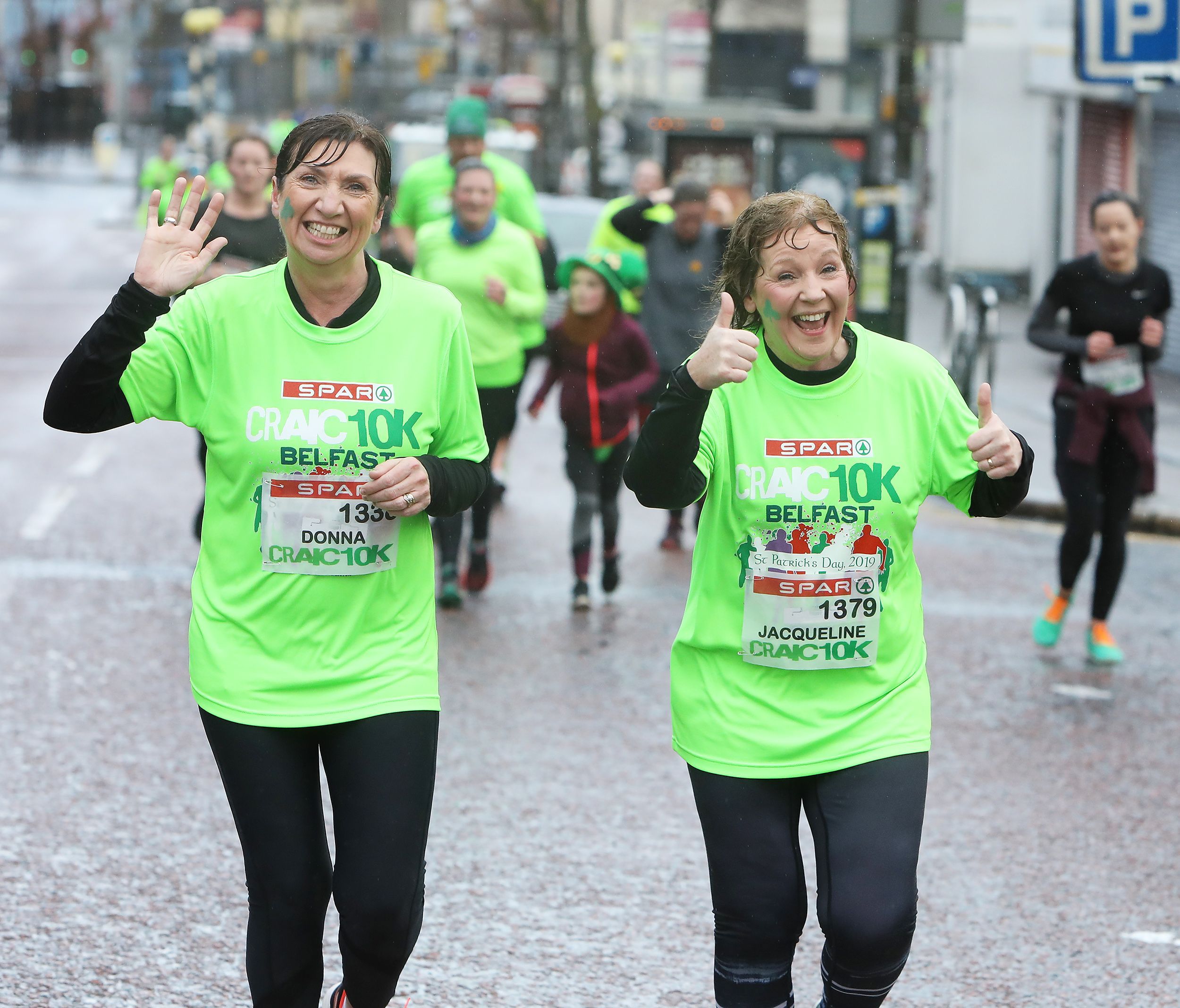 GREAT CRAIC: Above, taking part in the 2019 run in Belfast; left, the Global Ambassadors for this year’s run