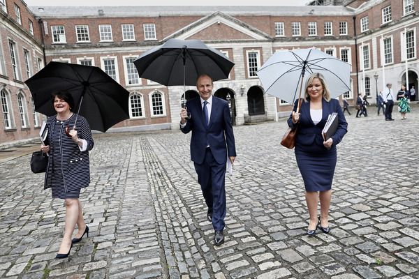 LET THE DEBATE BEGIN: First Minister Arlene Foster, Taoiseach Micheál Martin, deputy First Minister Michelle Devlin