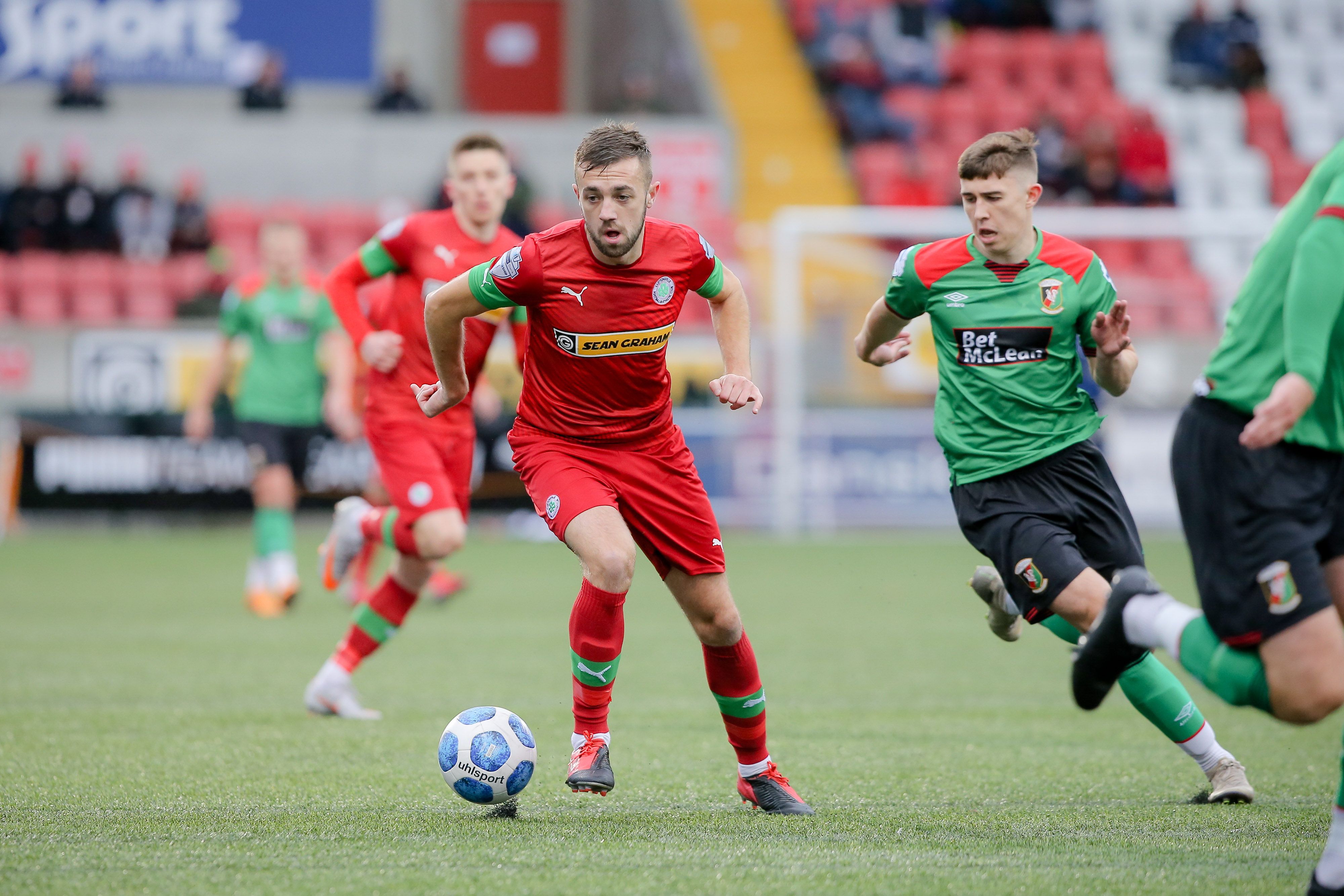 Speculation surrounds the future of Conor McMenamin who has attracted interest from Larne ahead of the close of the transfer window today