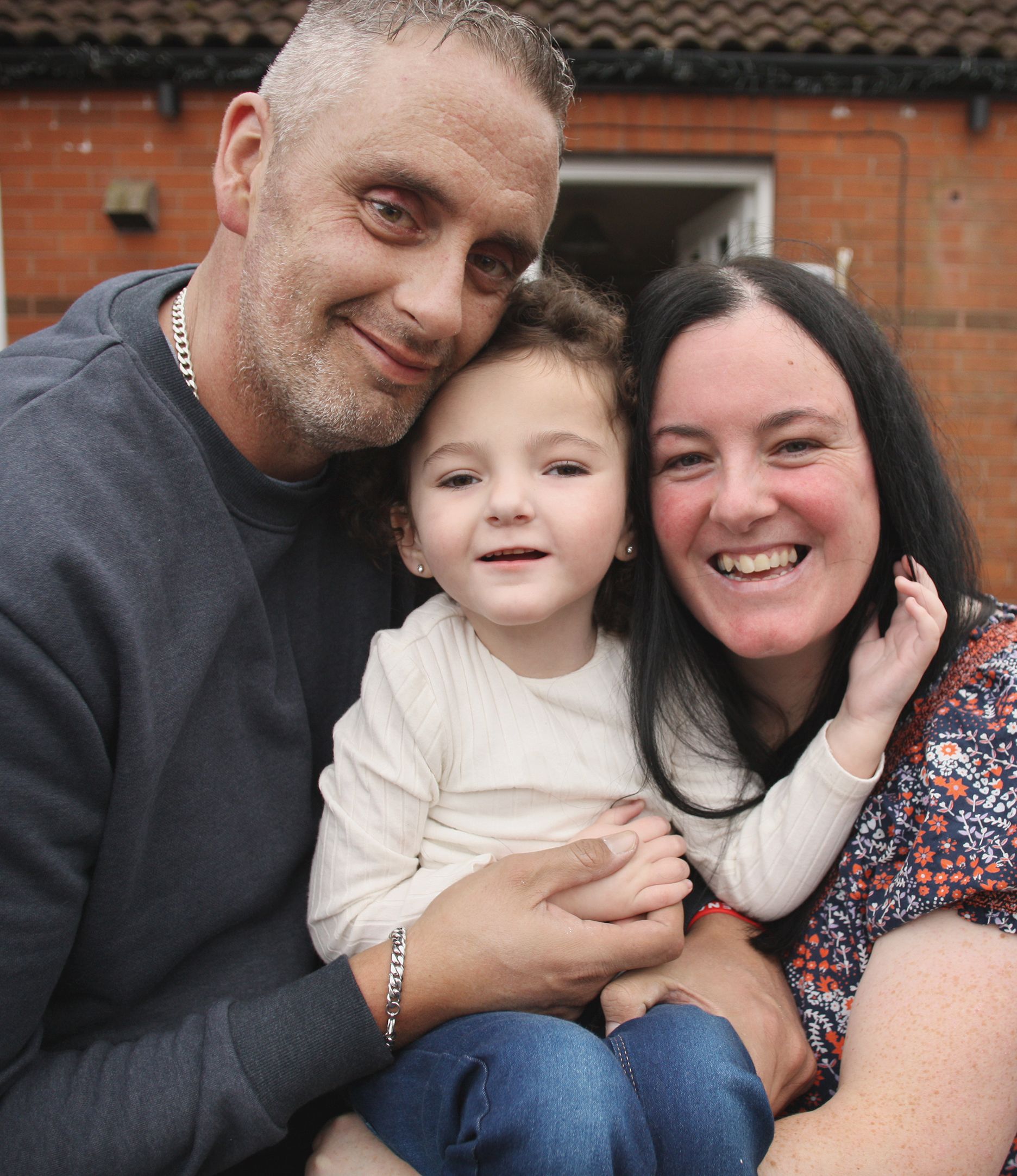 TOGETHER: Mum and dad Emma Morgan-Laverty and Andrew Laverty with their daughter Myah 