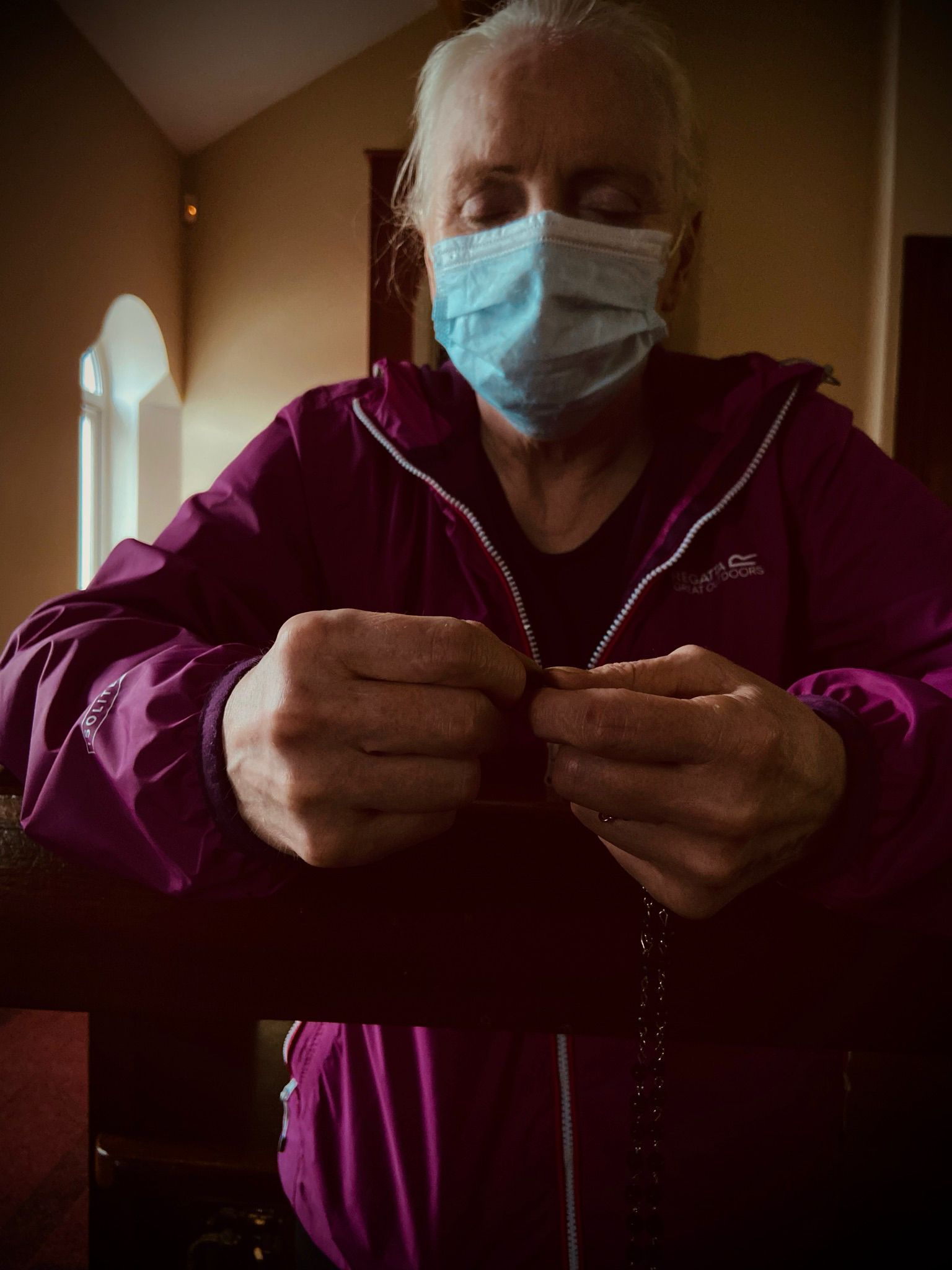 HIGHER POWER: A worshipper joins prayer group at Sacred Heart Parish Church in North Belfast which resumed this week after an 18-month break due to the pandemic