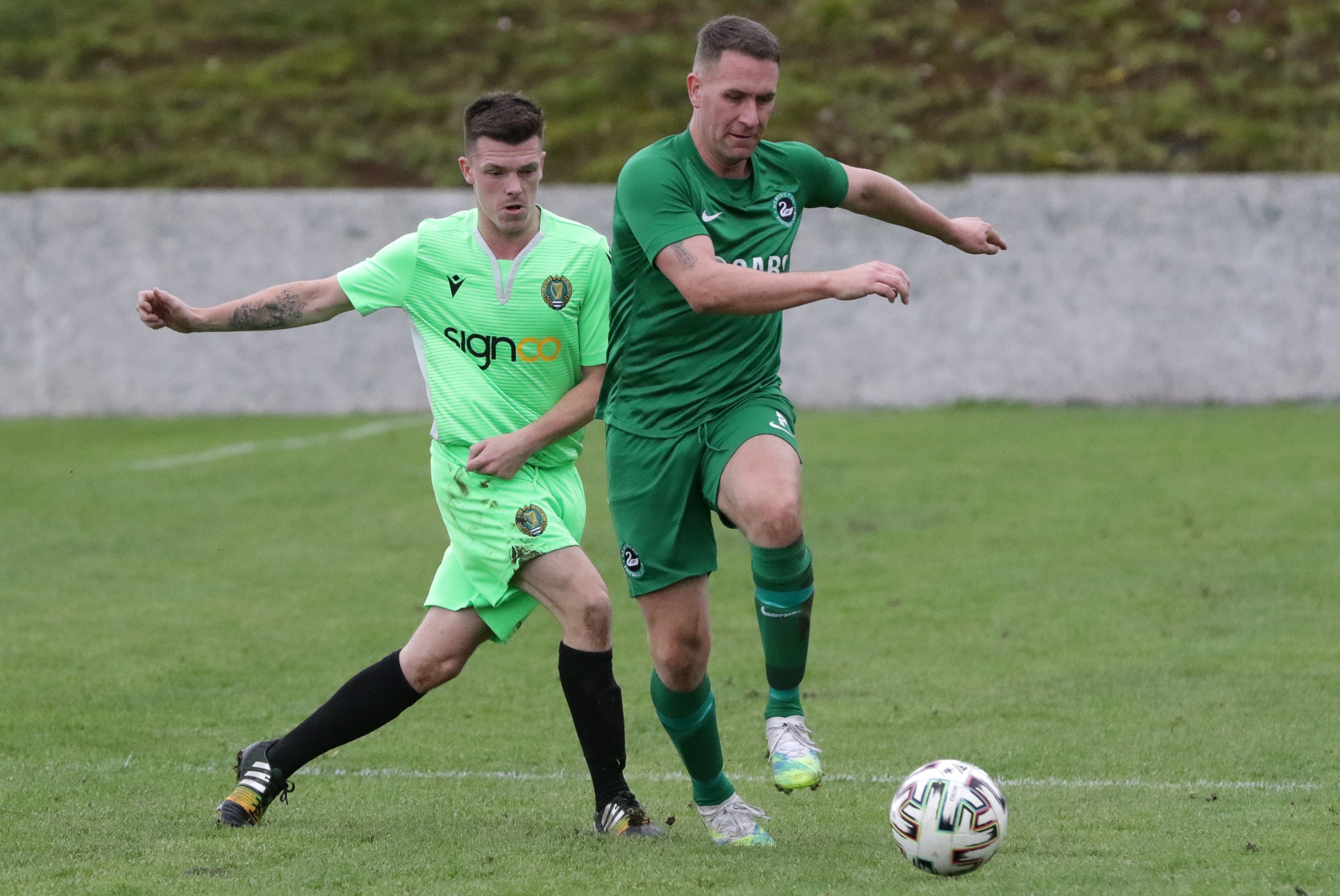Action from Saturday\'s cup tie at Glen Road Heights