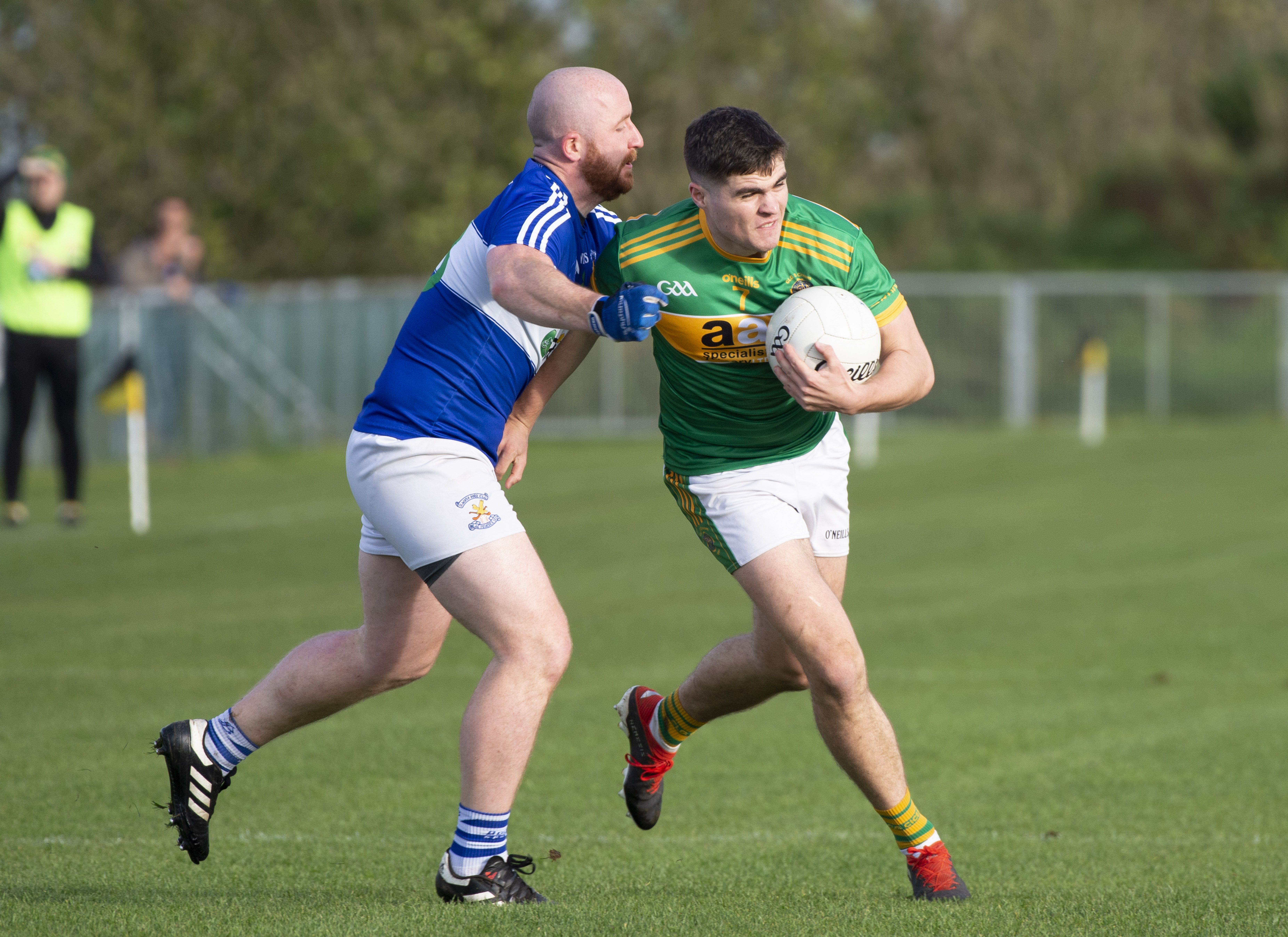Jamie McCann, pictured in action against St John\'s defender Andy McGowan, scored the vital goal as Creggan defeated St John\'s 1-8 to 0-8 at Naomh Éanna on Sunday afternoon 