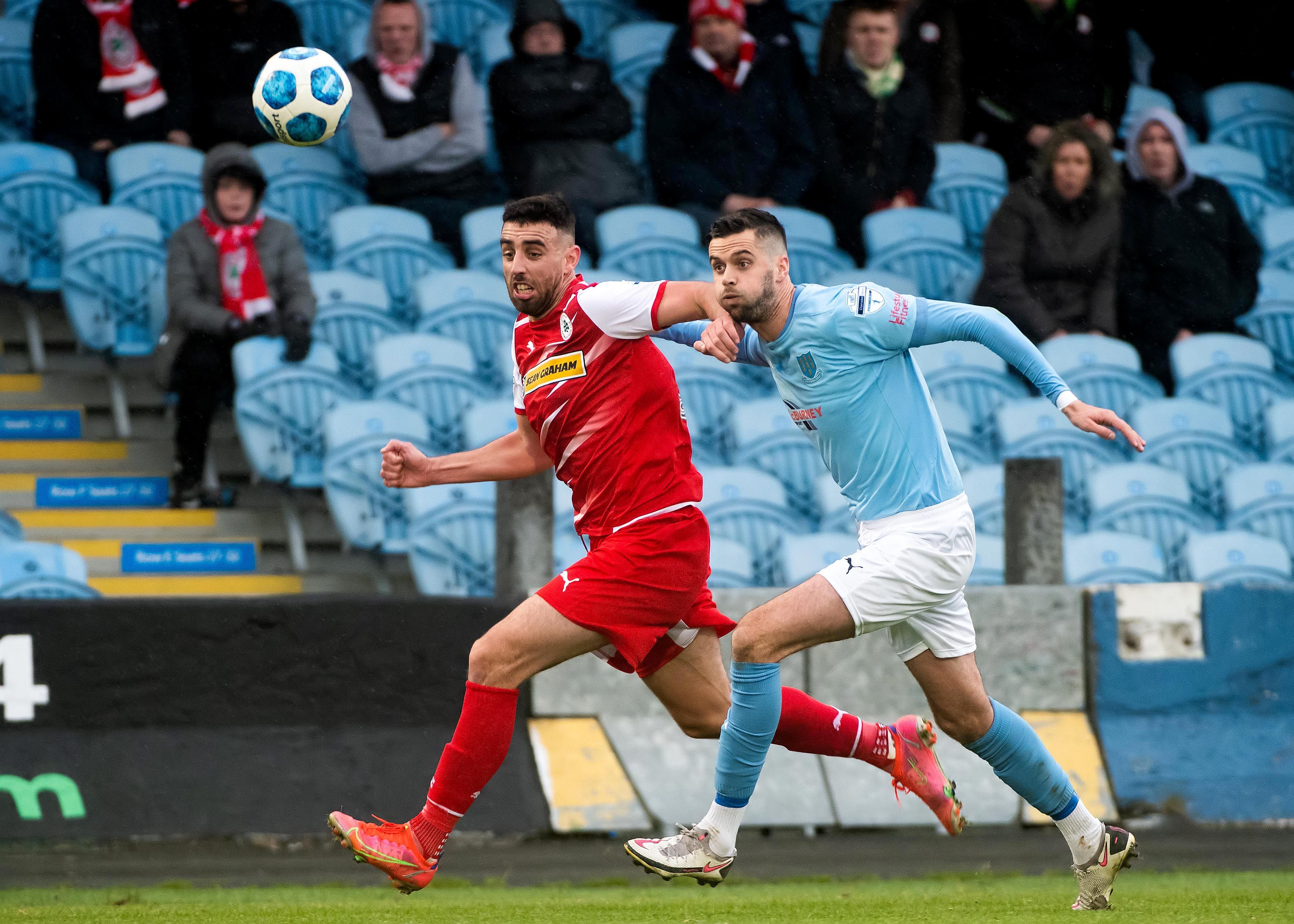 Cliftonville\'s Joe Gormley in action against Ballymena United\'s Caolan Loughran during Saturday\'s 1-0 defeat for the Reds at the Showgrounds