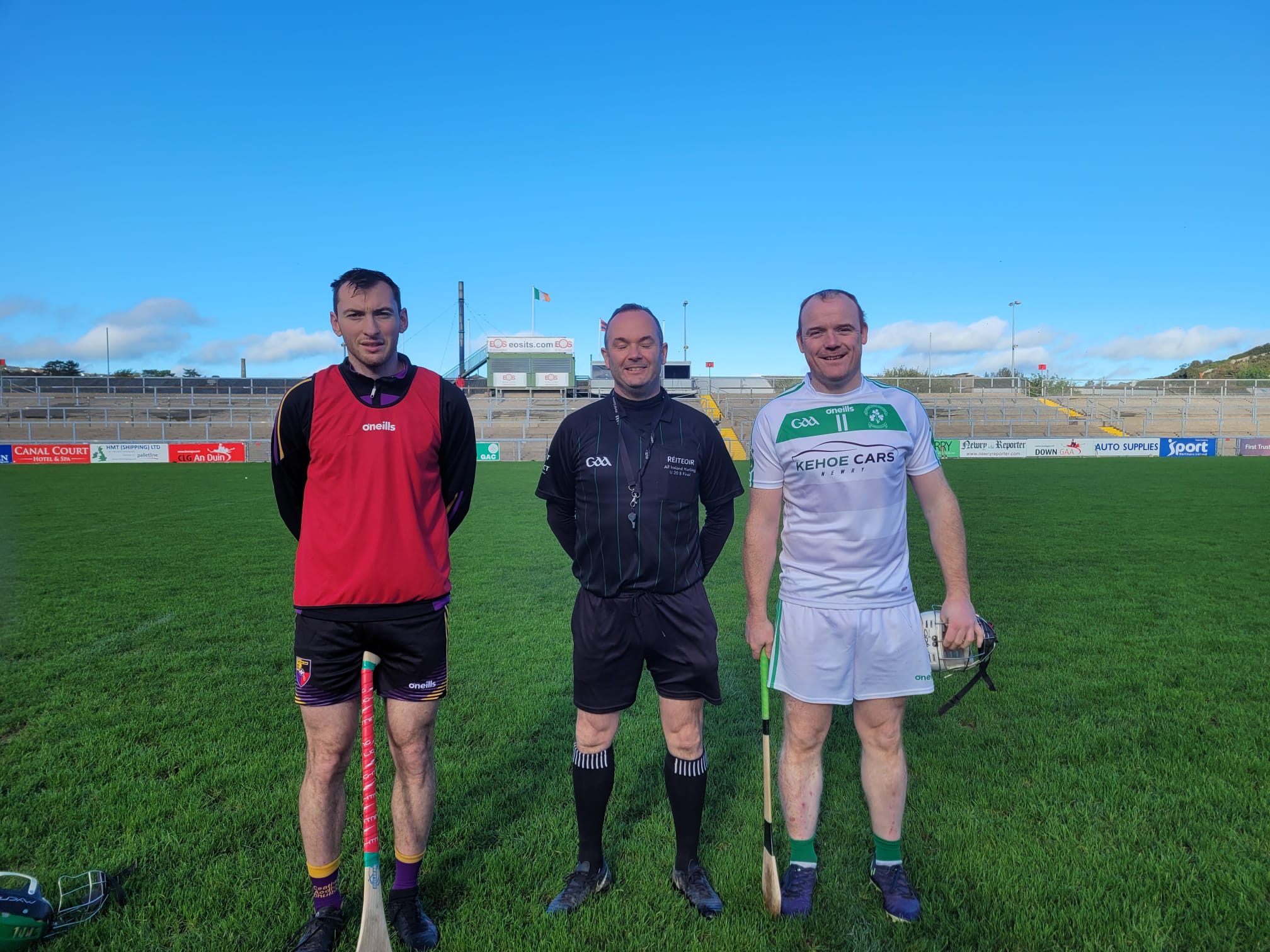 Referee Kevin Brady pictured with Carryduff captain Conor Cassidy and Newry Shamrock\'s skipper Eoin McGuinness prior to Saturday\'s Down IHC clash at Páirc Esler