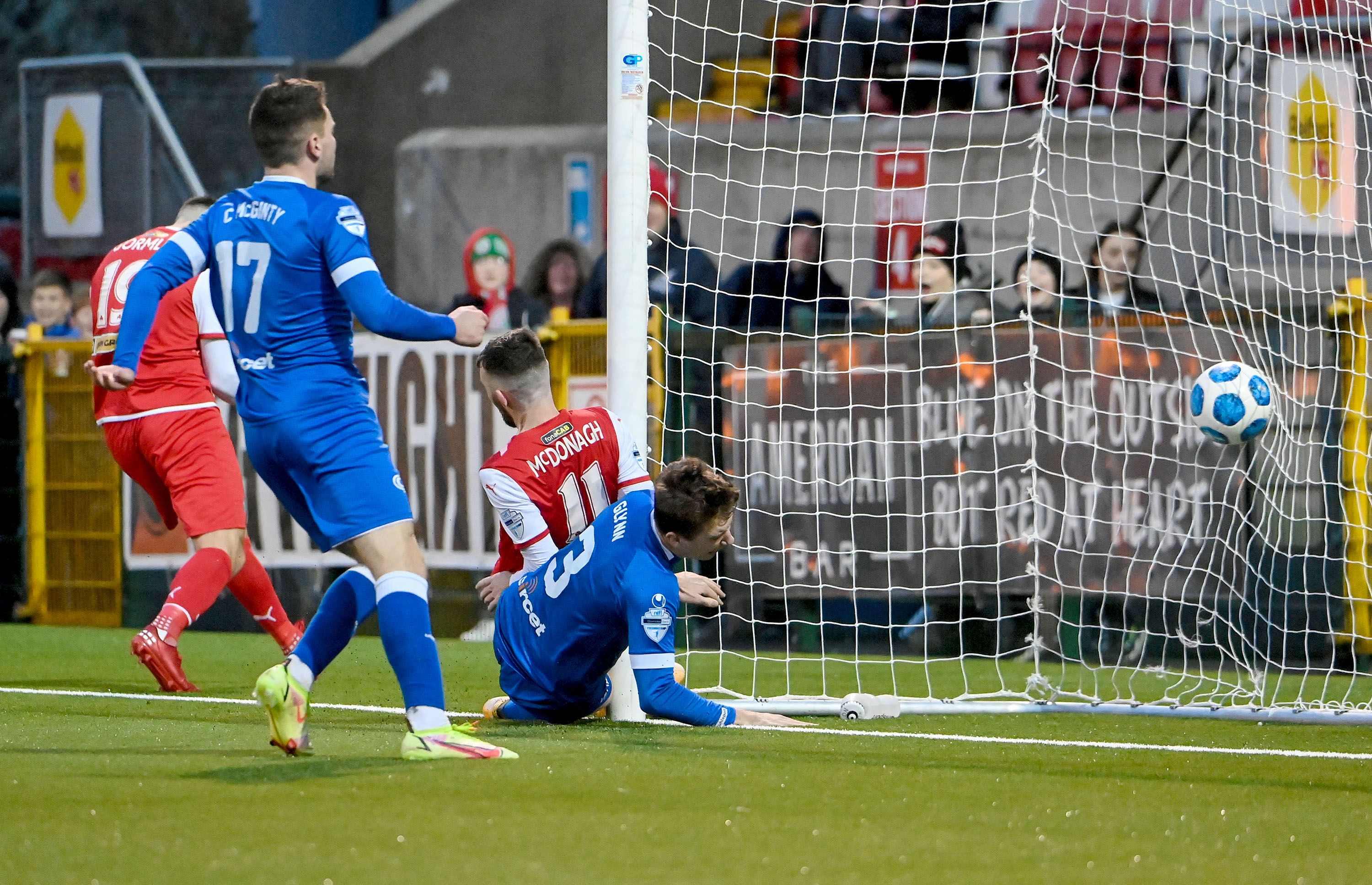 Jamie McDonagh collides with the post when scoring Cliftonville\'s third goal on Saturday