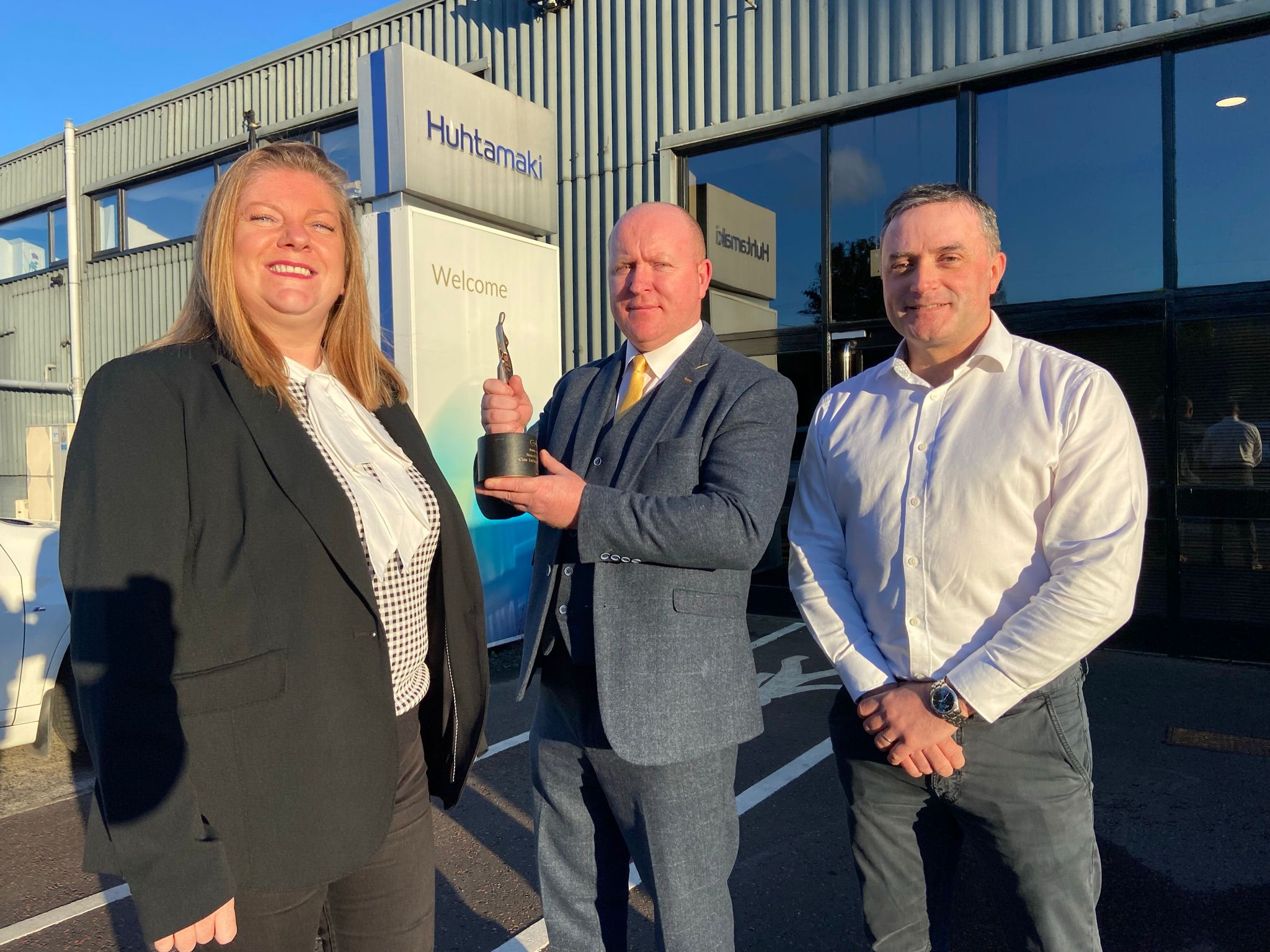 SMALL BUSINESS: Christina Solan from Belfast Media Group, with Francis Cullen, Mercury Security and Facilities Management, alongside Paddy Crilly from Hutamaki