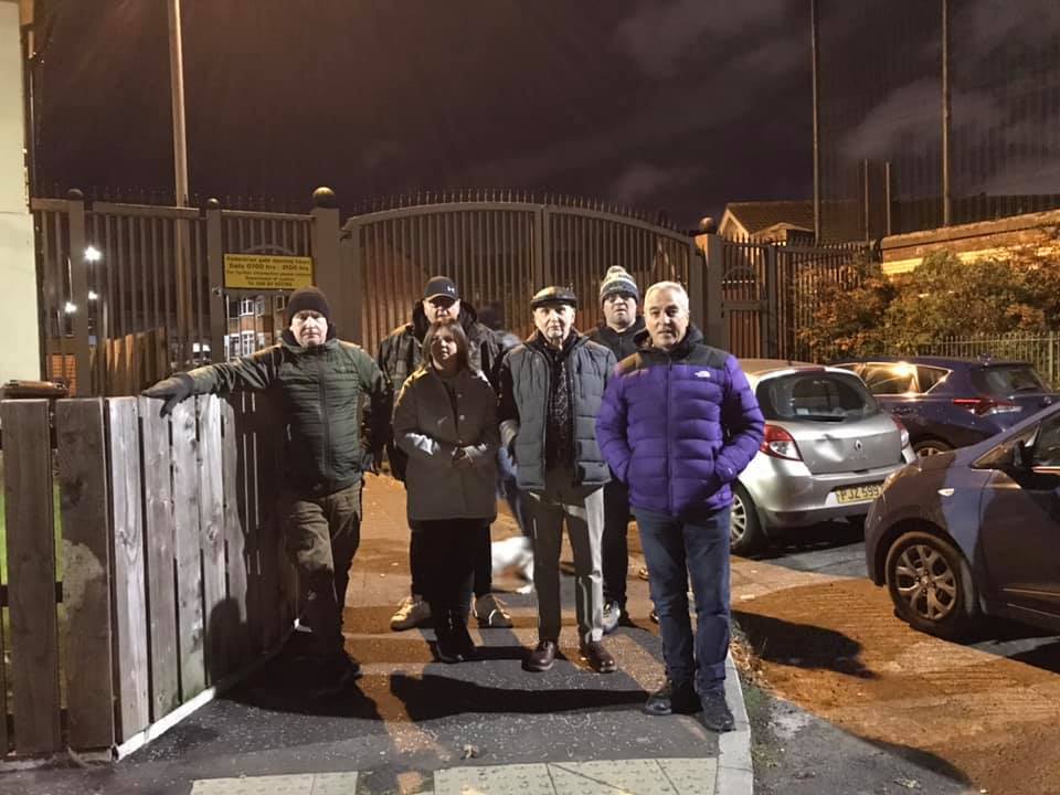 ON THE STREETS: Members of Clonard Residents\' Association alongside Pat Sheehan MLA at the Springfield interface