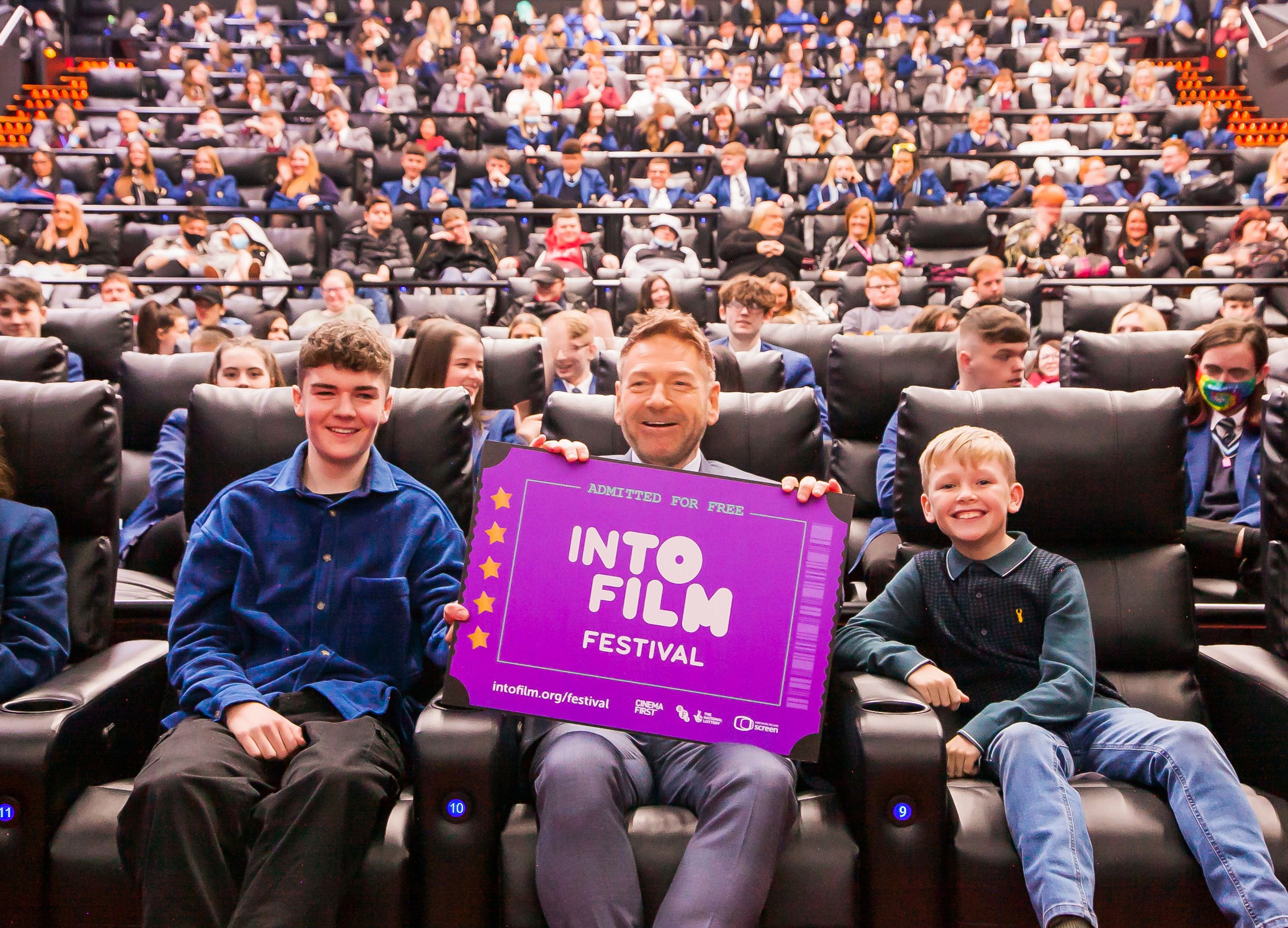 ADVICE: Kenneth Branagh at the Into Film Festival with \'Belfast\' stars Jude Hill and Lewis McAskie and 200 schoolchildren 