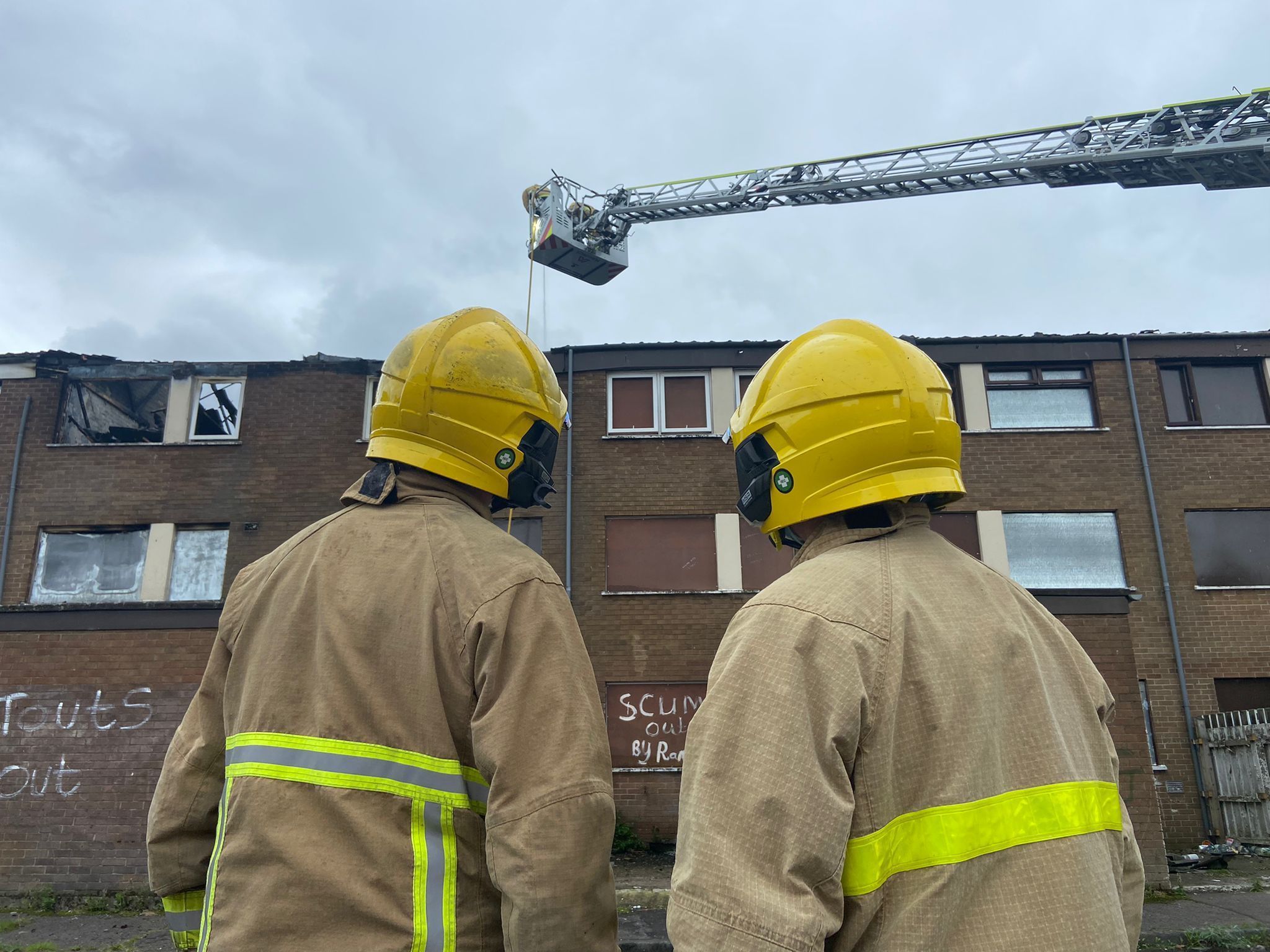 KEEPING PEOPLE SAFE: Firefighters at the scene of an earlier fire at Ross Street flats