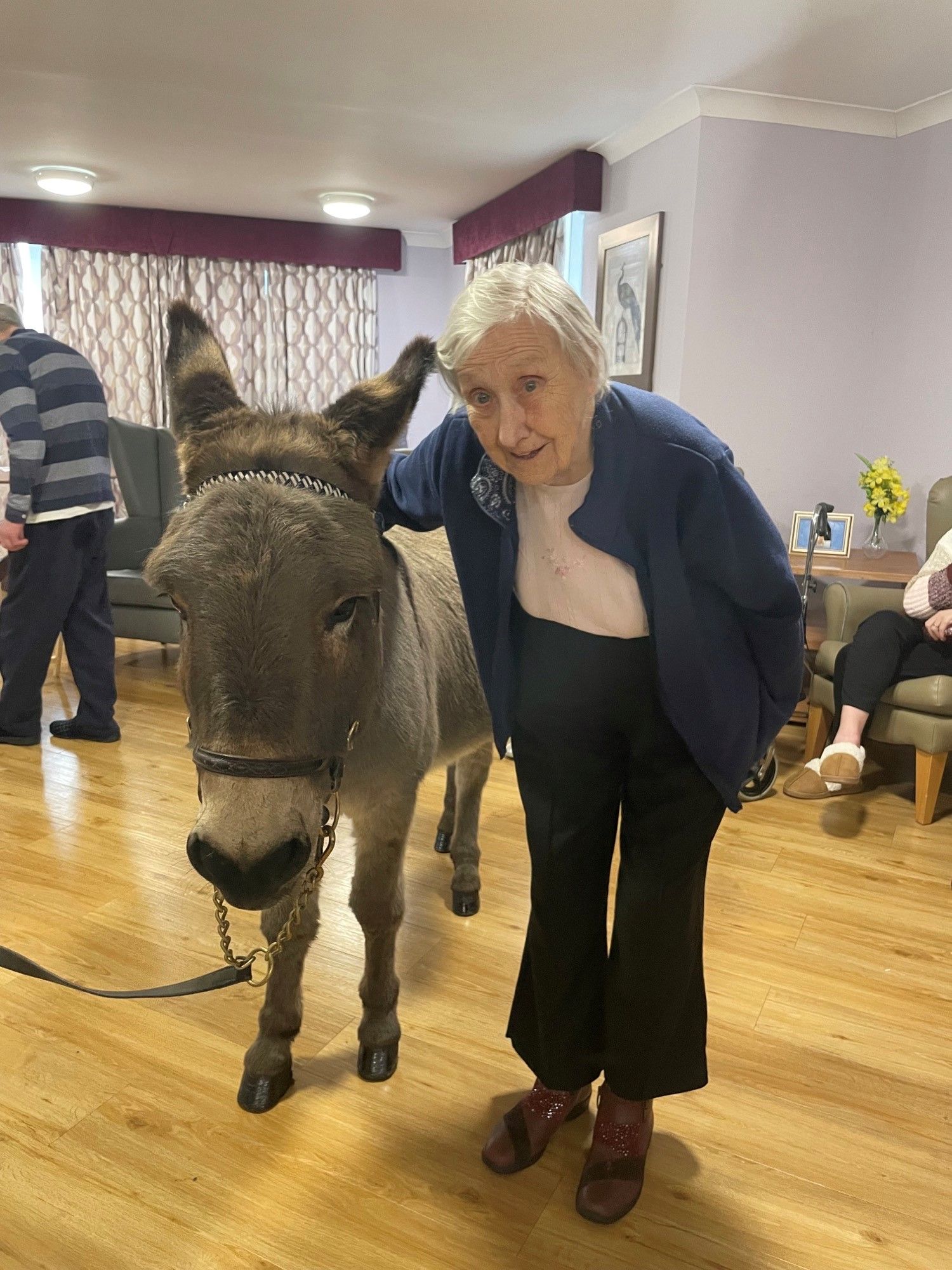 MEMORIES: Resident Agnes Creeth enjoyed the visit from Peanut and Tipple