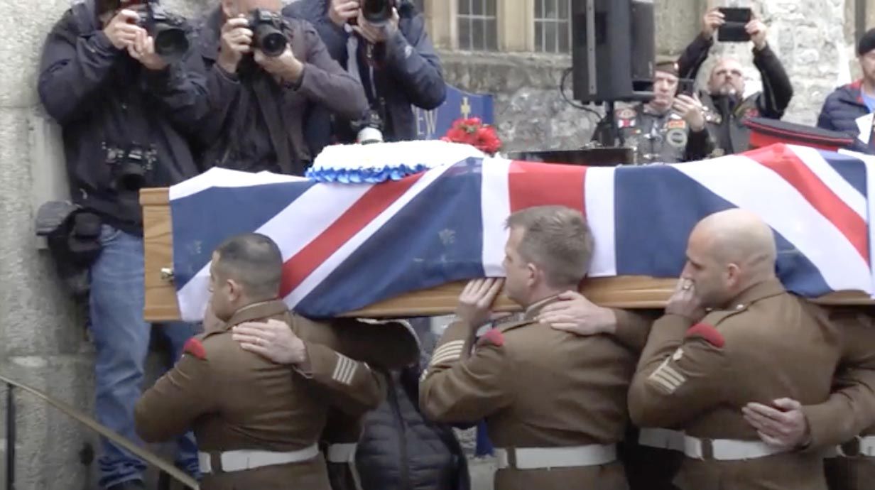 TRIBUTE: The coffin of Dennis Hutchings is carried into a Plymouth church for requiem service