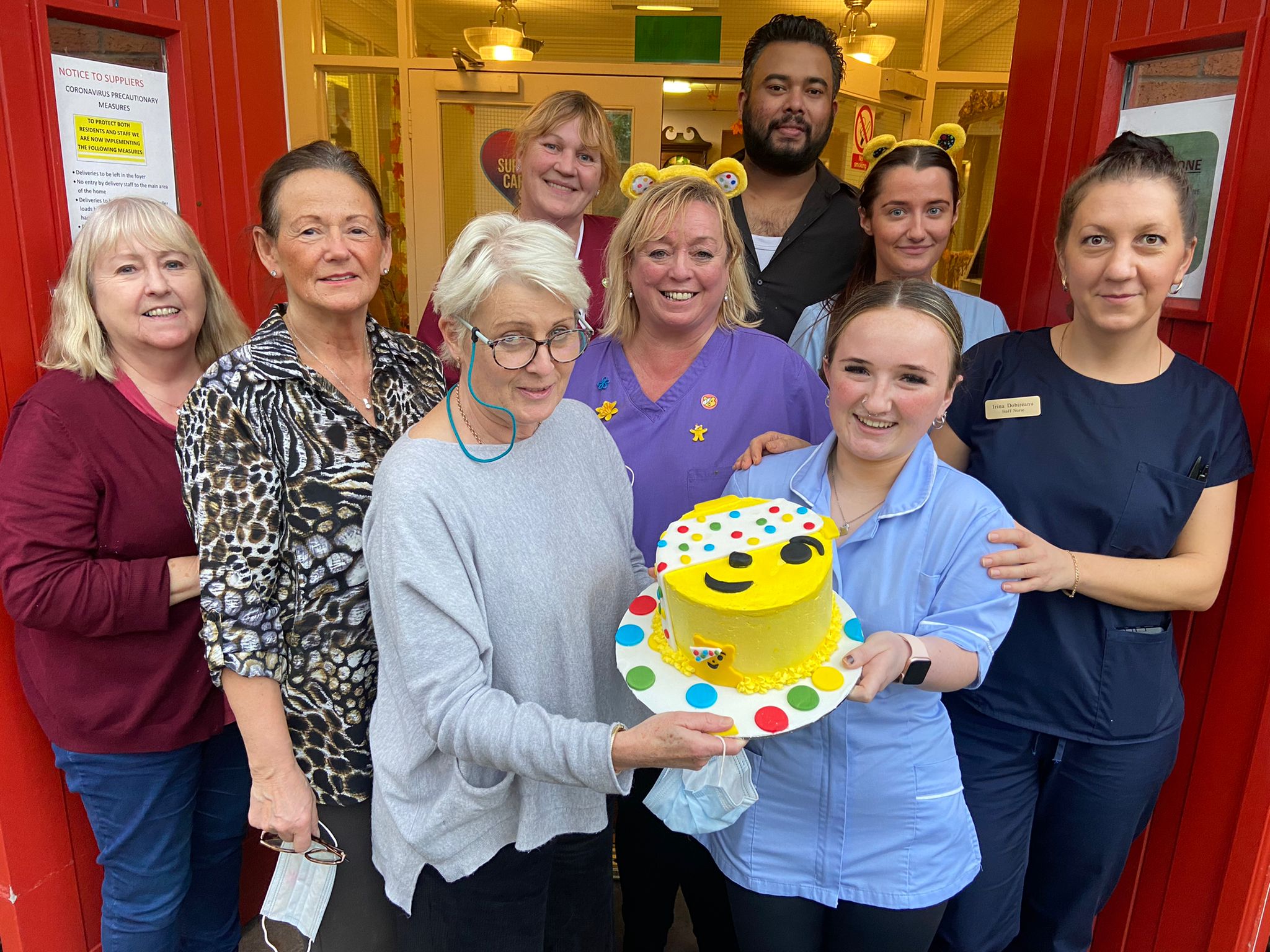 POUNDS FOR PUDSEY: Staff and families at Fruithill Nursing Home raised over £250 by performing the slush at an afternoon tea for Children in Need