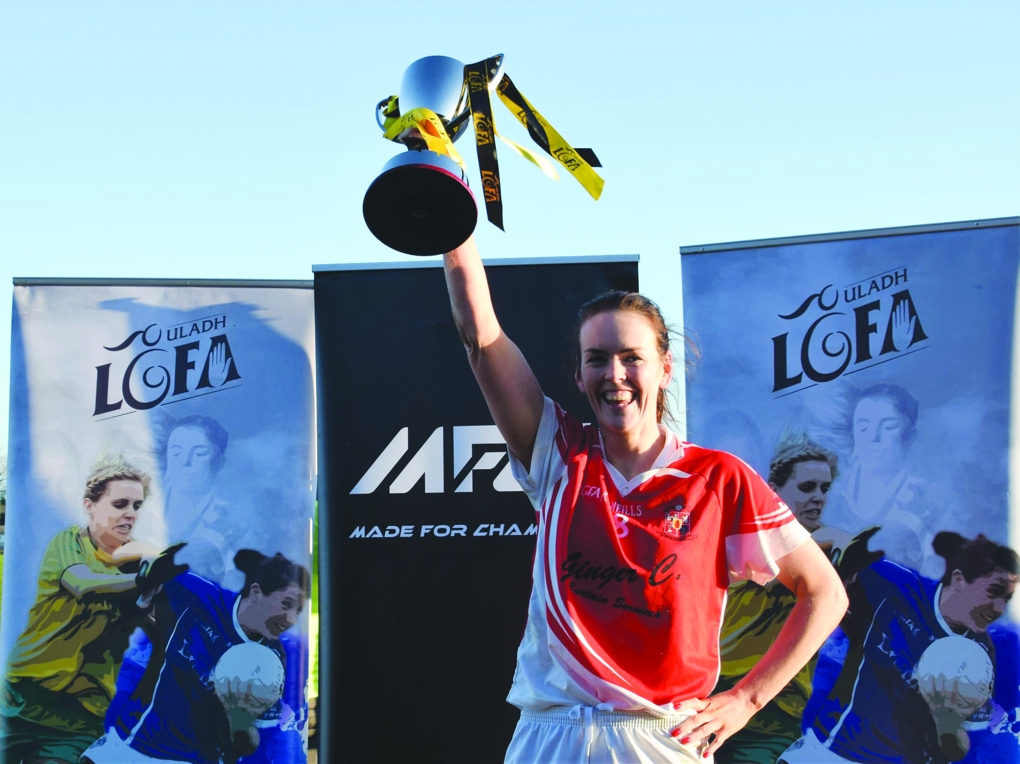 Donaghmoyne captain Amanda Finnegan lifts the cup following her side\'s eight-point victory over Bredagh in Sunday\'s Ulster Ladies\' Senior Club Championship final replay in Crossmaglen 