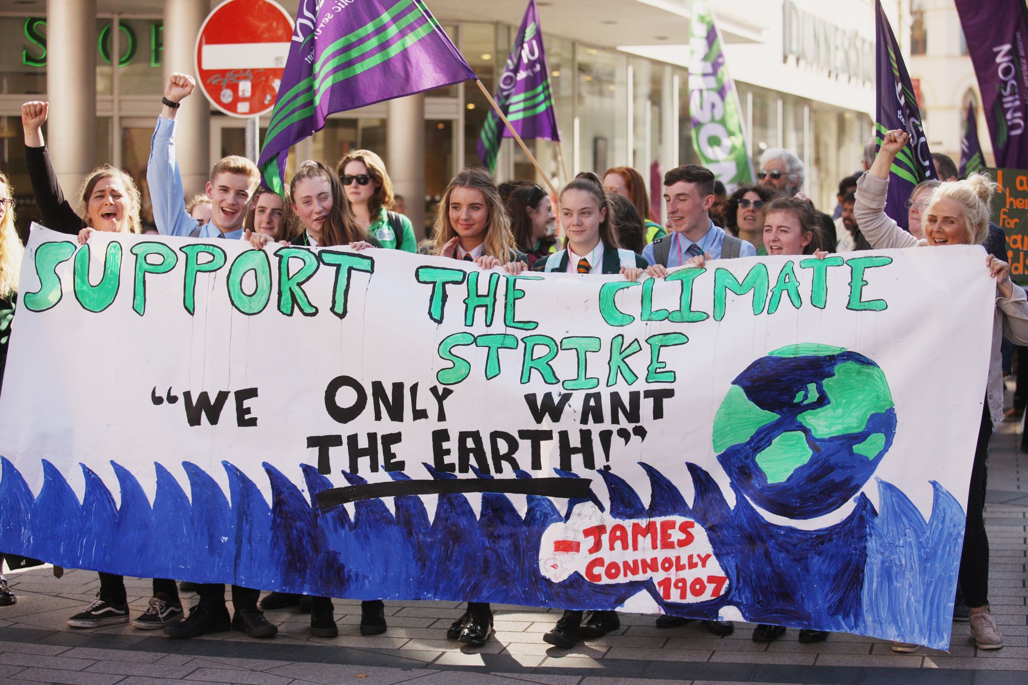 INEQUALITY UNDERLIES CLIMATE EMERGENCY: Young people protesting against global warming in Belfast