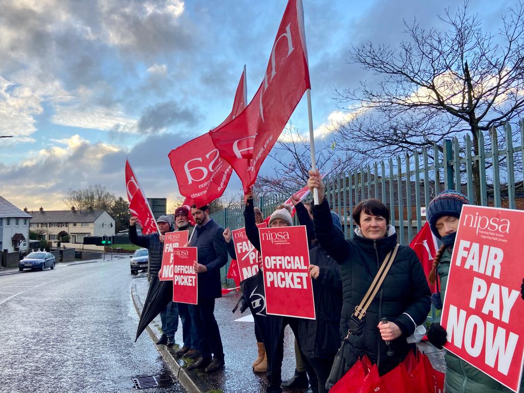 TAKING A STAND: Education Welfare Officers on the picket line outside Whiterock Library