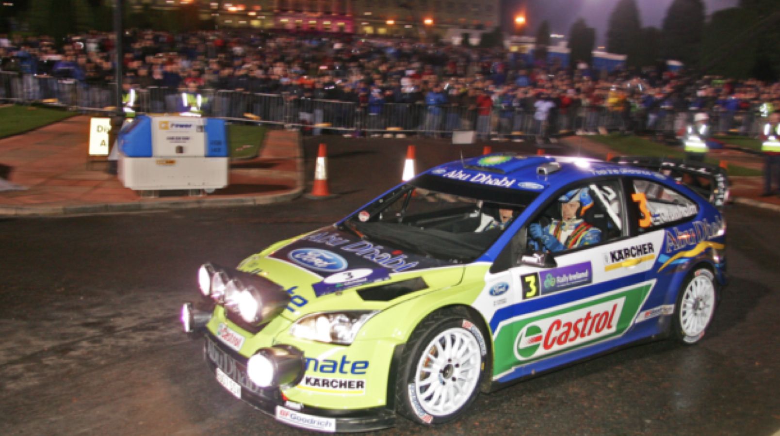 HUGE DRAW: Marcus Gronholm on the Stormont stage of Rally Ireland 2007; below, Petter Solbert signing autographs at the Stormont event, which drew massive crowds (pics courtesy of Roy Dempster)