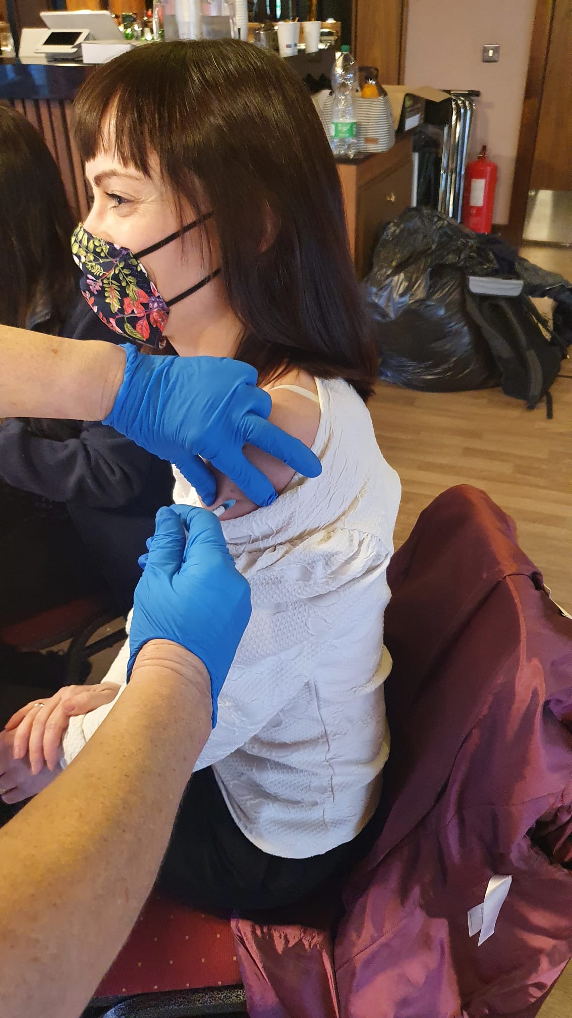 GET BOOSTED: North Belfast SDLP MLA Nichola Mallon receives her Covid-19 vaccine booster at Crusaders Football Club