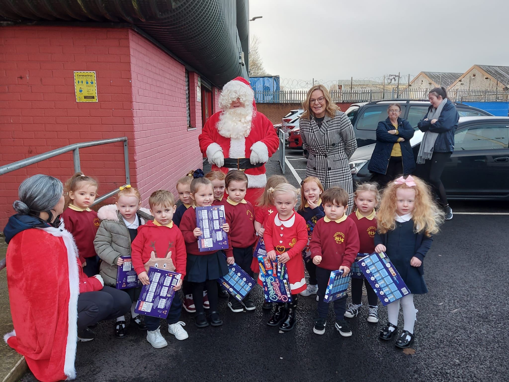 HO-HO-HO: Santa, Mrs Claus and Santa\'s helper, Cllr Tina Black, at the Grosvenor Recreation Centre on Tuesday