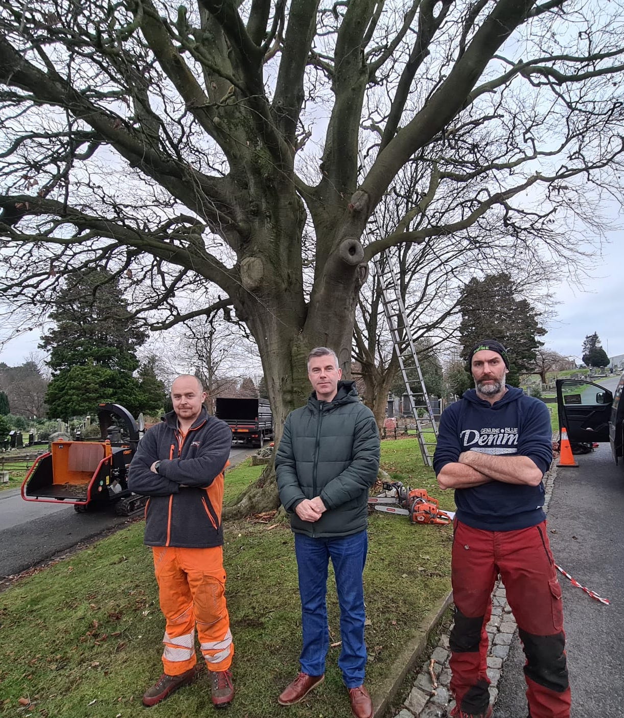 FAMILIAR SIGHT: Cllr Steven Corr (centre) with tree surgeons Barry Fitzpatrick and Richard Carson