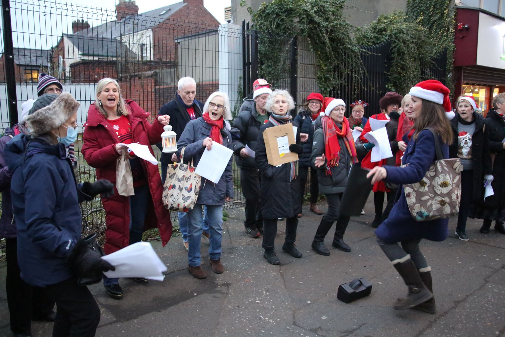 CAROLS: Singers out on the Ormeau Road last weekend