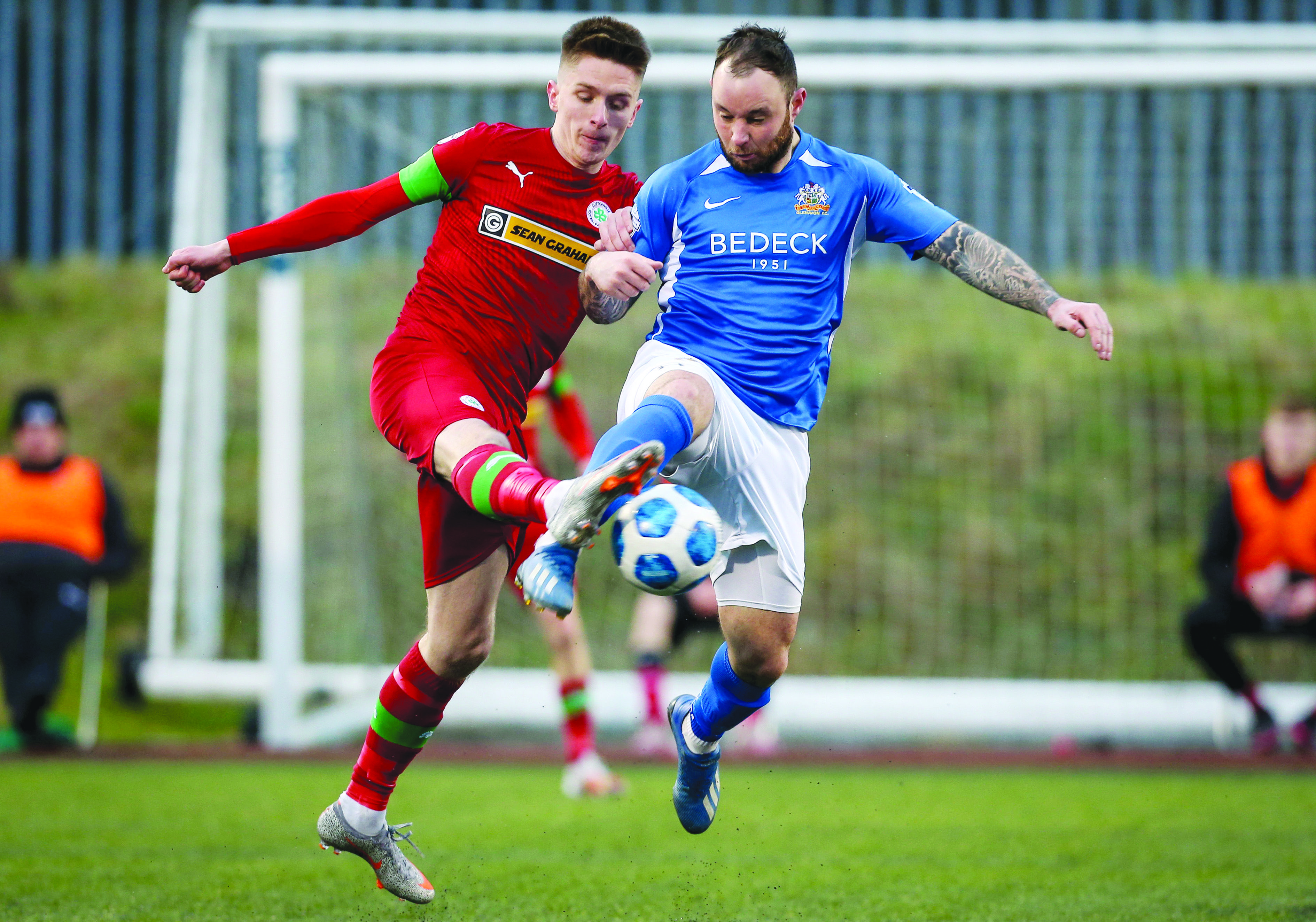 Cilftonville’s Ryan Curran challenges Andrew Doyle of Glenavon last season while the Lurgan Blues are set to host the Reds at Mourneview Park on New Year’s Day
