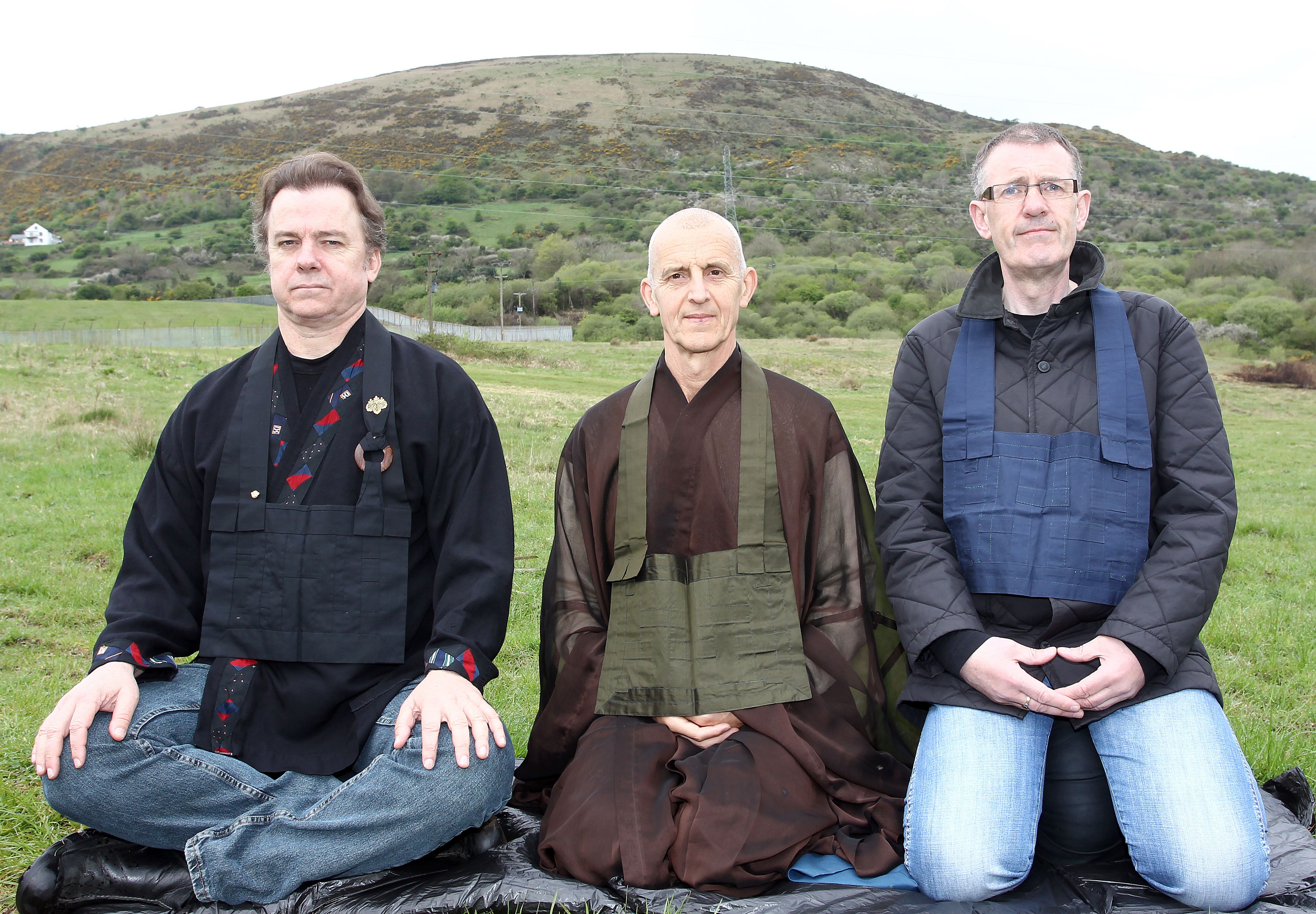 TRANSCADENTAL TRIO: Michael O\'Keefe, Buddhist priest (orginally from Andersonstown) Paul Haller, and Frank Liddy on Belfast Hills in 2010 for the announcement of launch of Black Mountain Zen Centre.