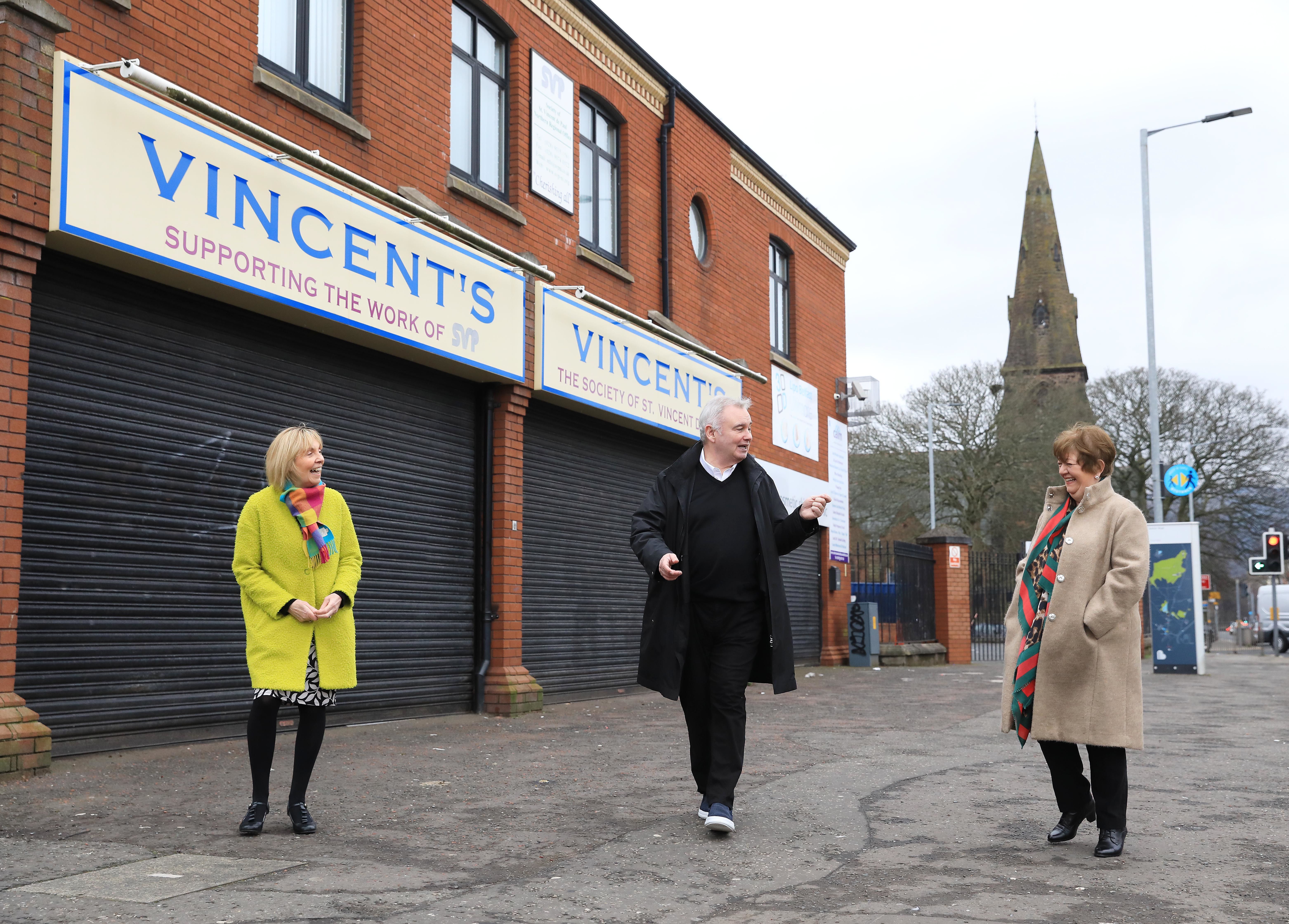 HOME BOY: Eamonn Holmes with Pauline Brown (left), Regional Manager, and Mary Waide, Regional President of St Vincent de Paul